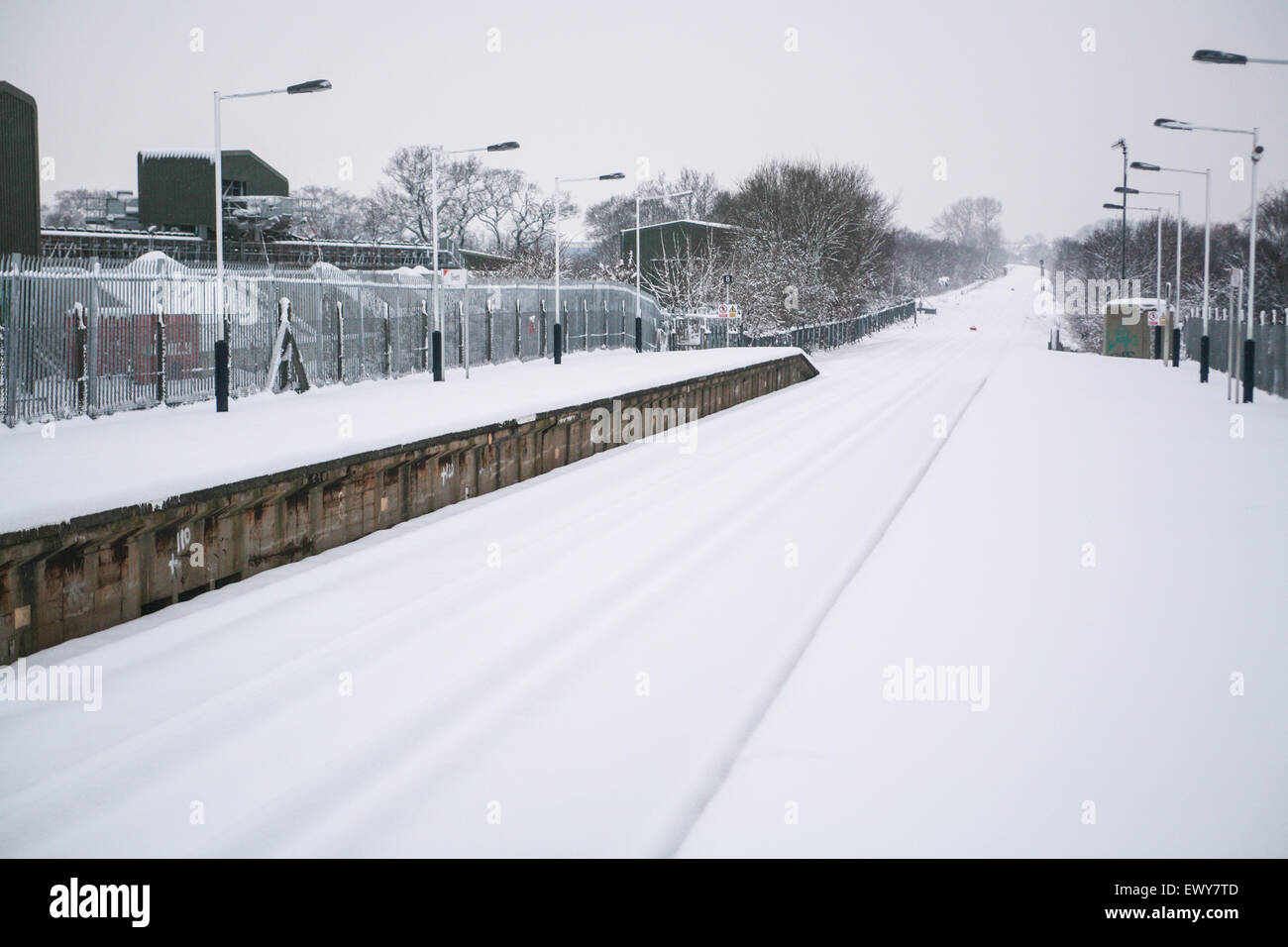 View from snow covered platform at Tolworth train station, in Tolworth south-west London. No trains operated that day.The infamo Stock Photo