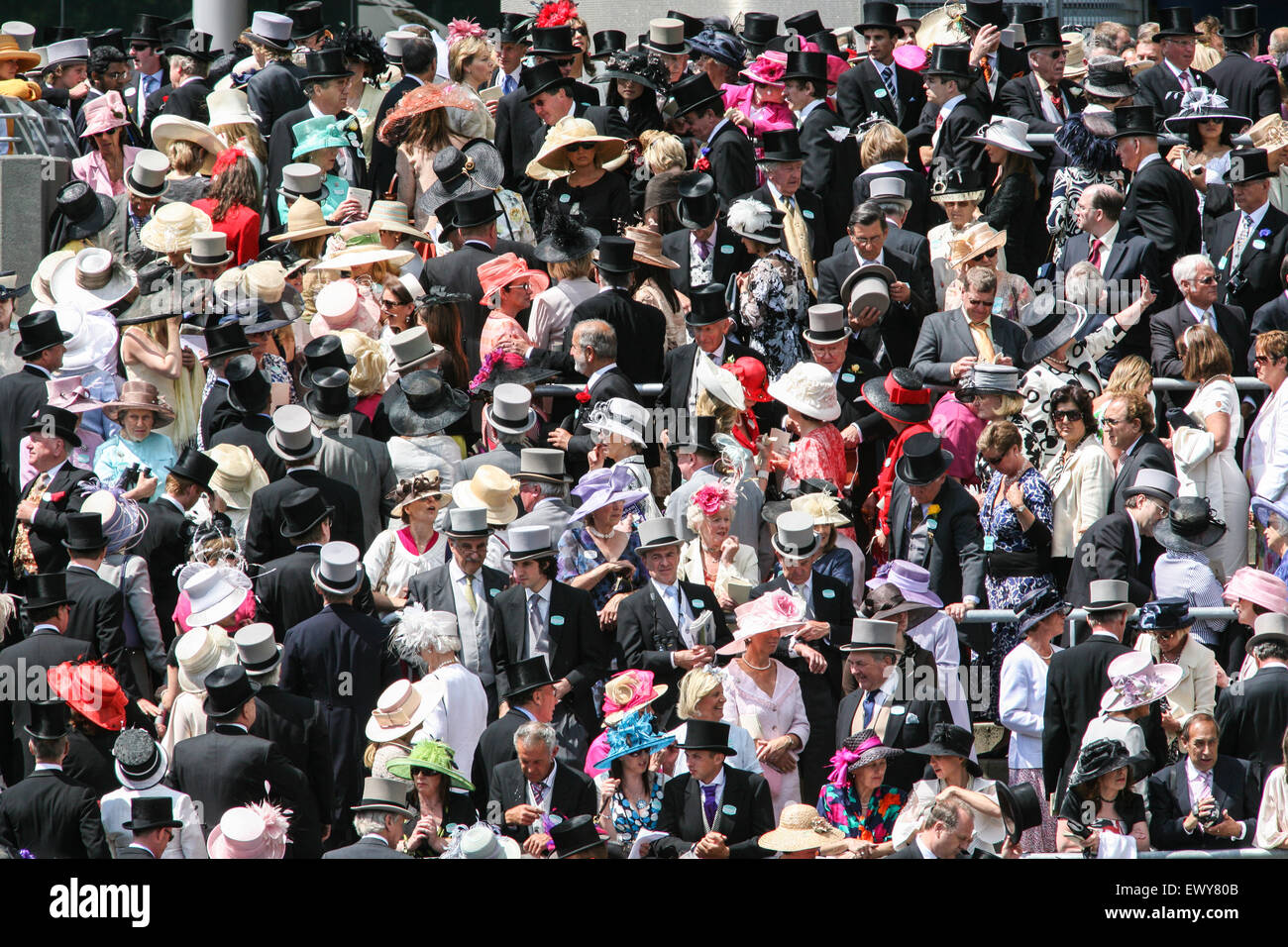 Top hats and fashionable clothes during Royal Ascot horse racing meeting, the world's most famous horse racing meeting. Attended Stock Photo