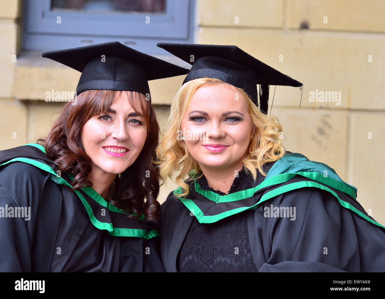 University of Ulster (Magee Campus) students pose for photographs on graduation day. Stock Photo