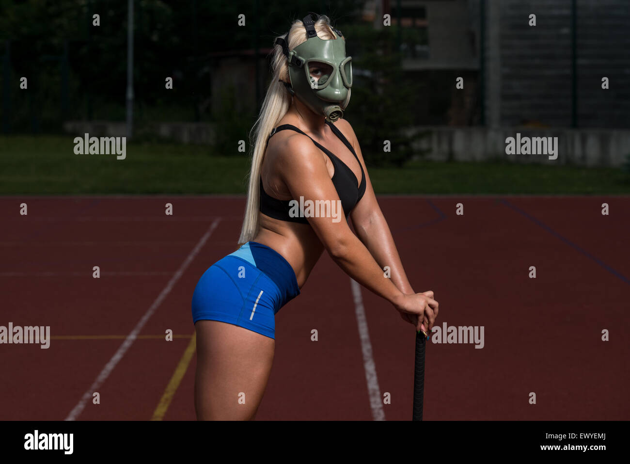 Crossfit sledge hammer man workout hires stock photography and images