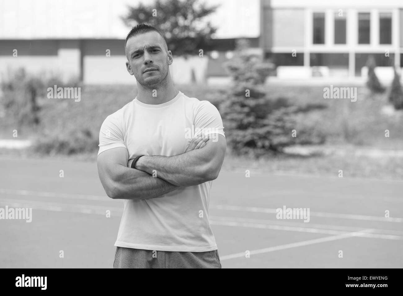 Young Man In Sports Clothing After Outdoor Exercises Stock Photo Alamy
