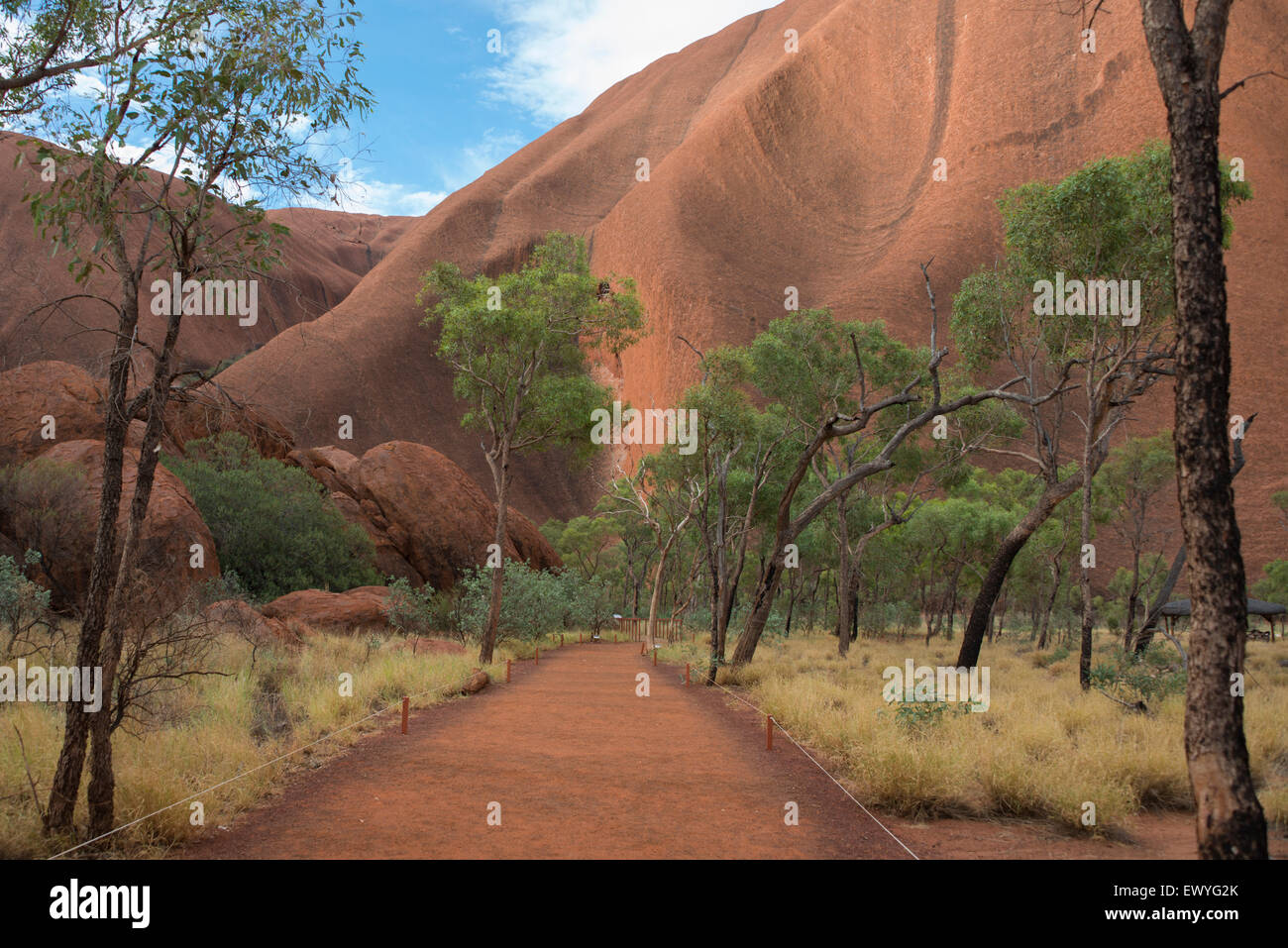 Australia, NT, Uluru - Kata Tjuta National Park. Uluru aka Aires Rock. Trail around the base of Aires Rock. Stock Photo