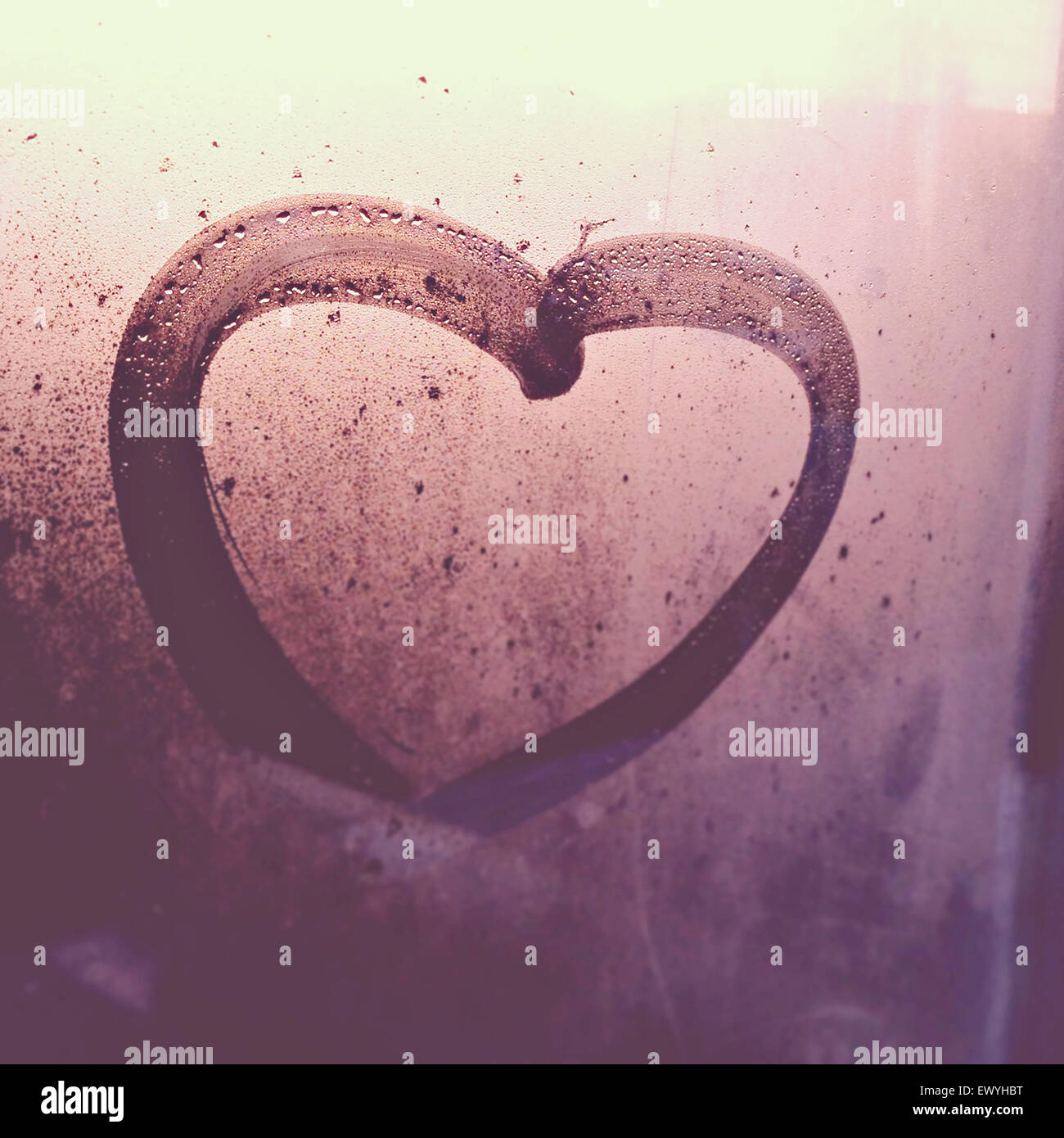 Heart drawn on a wet window Stock Photo