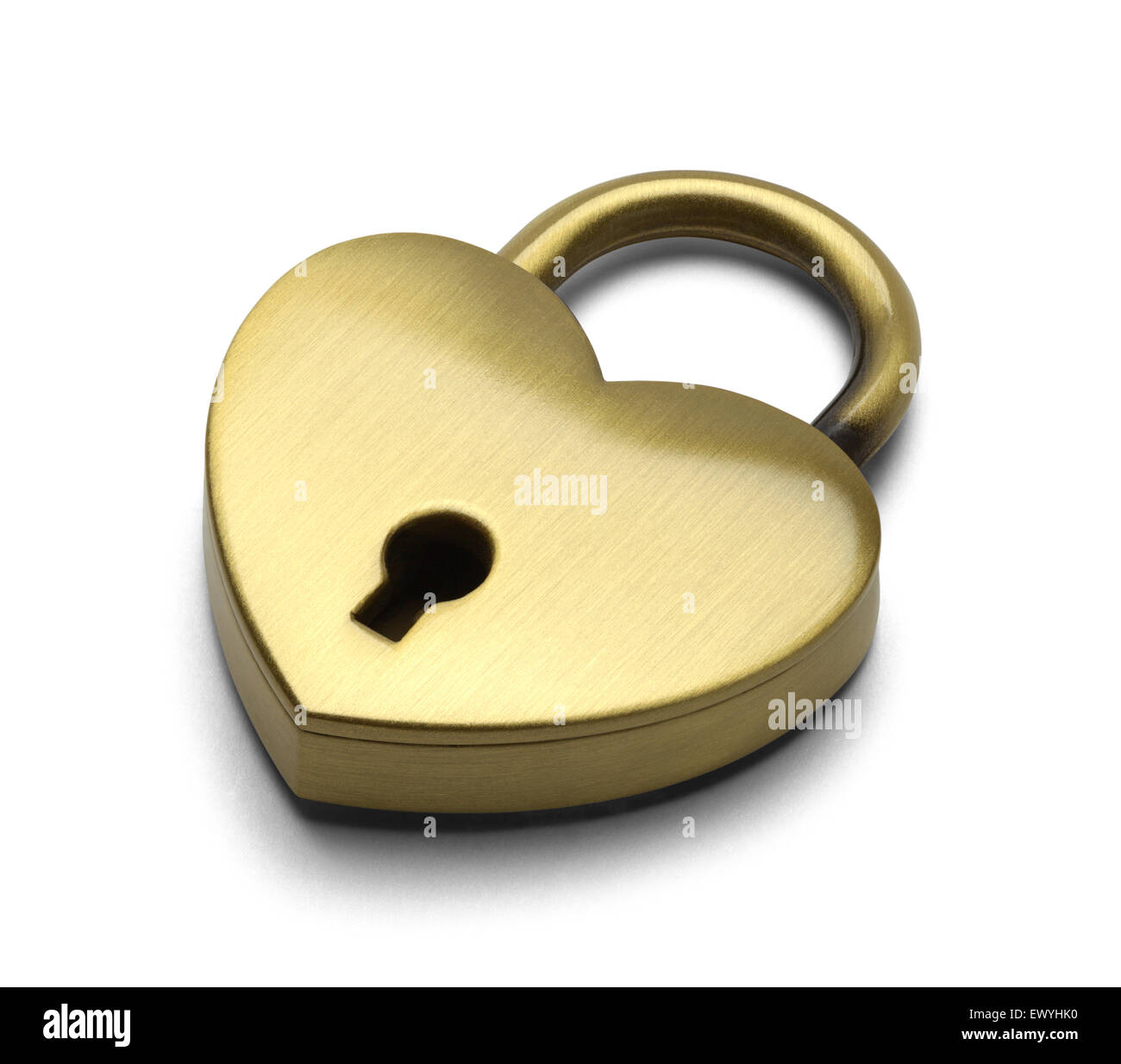 Brass Heart Isolated on a White Background. Stock Photo