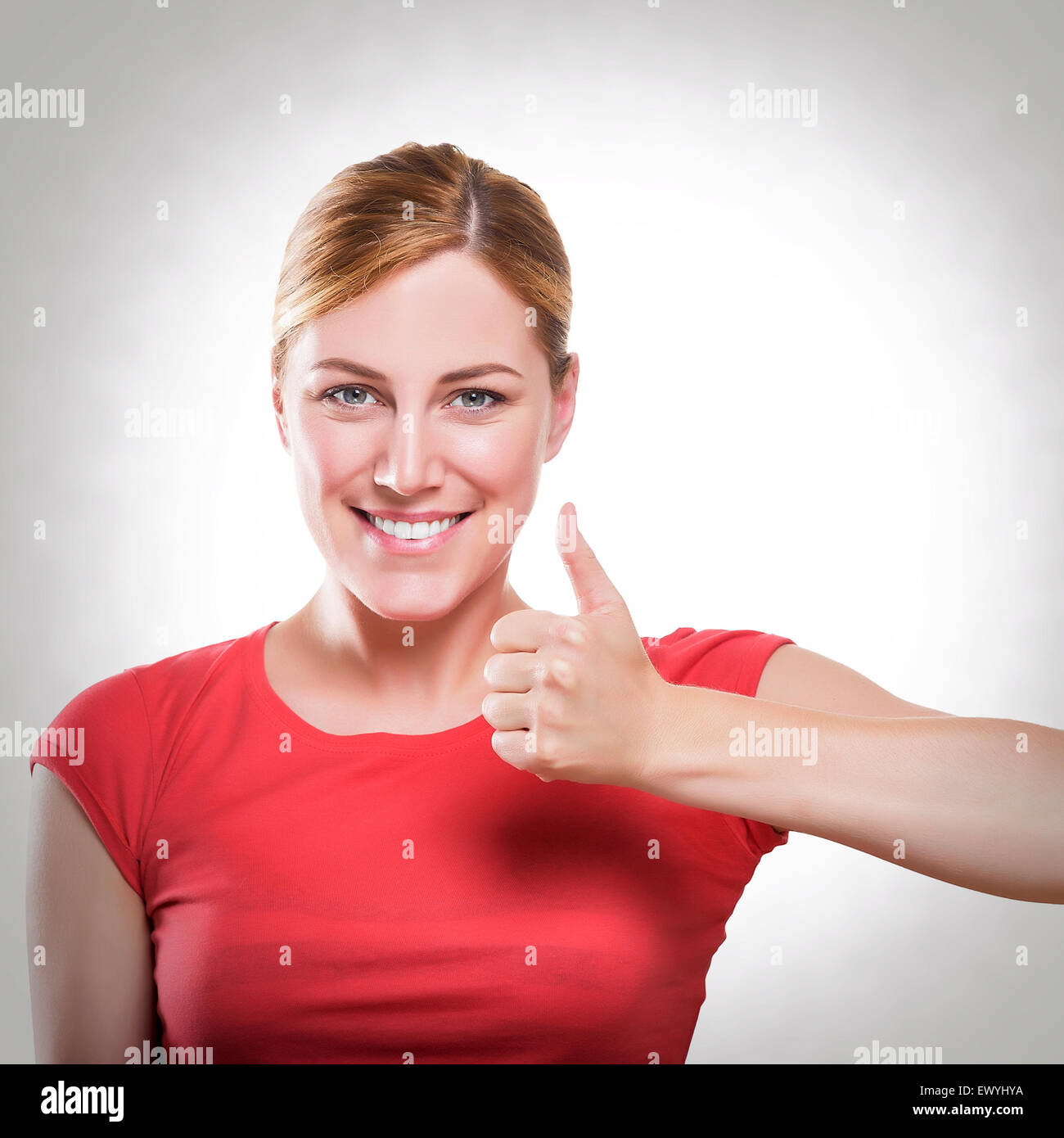 Blonde Showing Thumbs Up Stock Photo Alamy