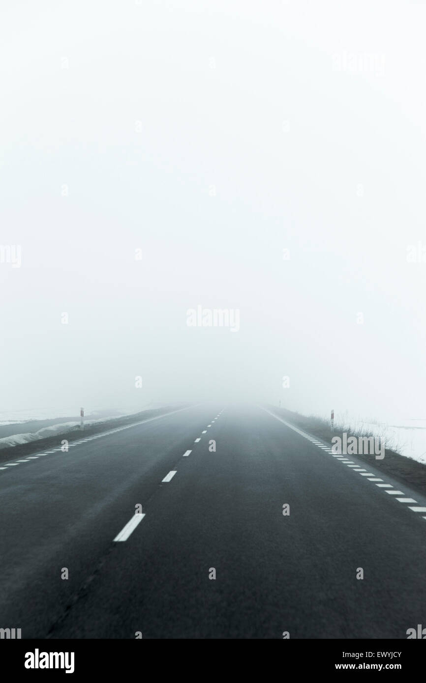 A foggy road Stock Photo