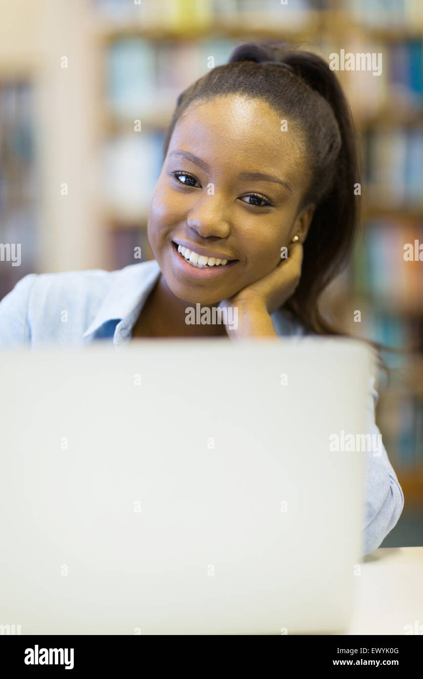 attractive young college girl looking at the camera Stock Photo - Alamy