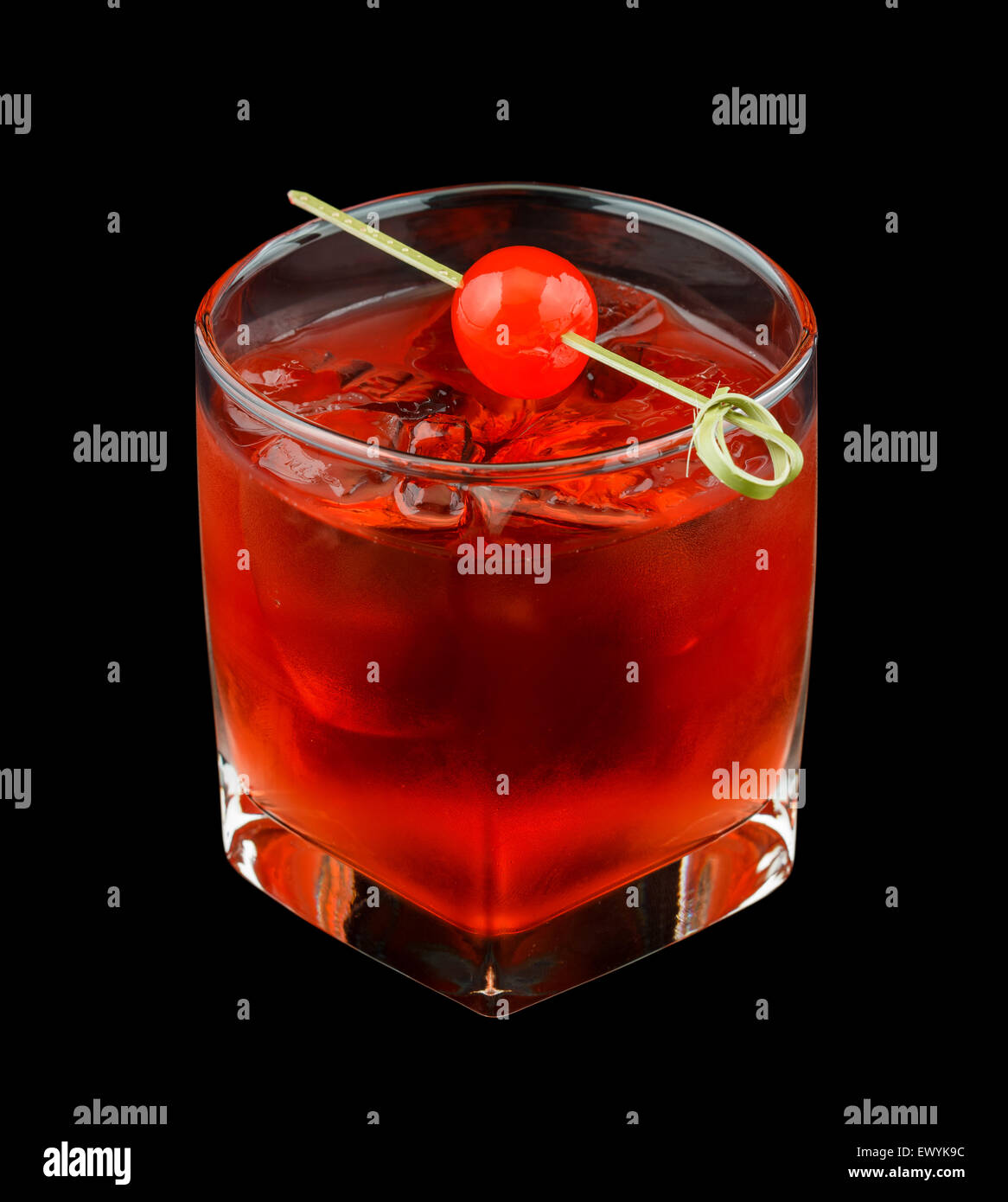Red Drink With A Maraschino Cherry Isolated On Black Stock Photo Alamy