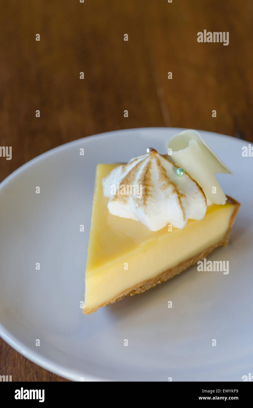 Slice of new york style cheesecake on the plate Stock Photo