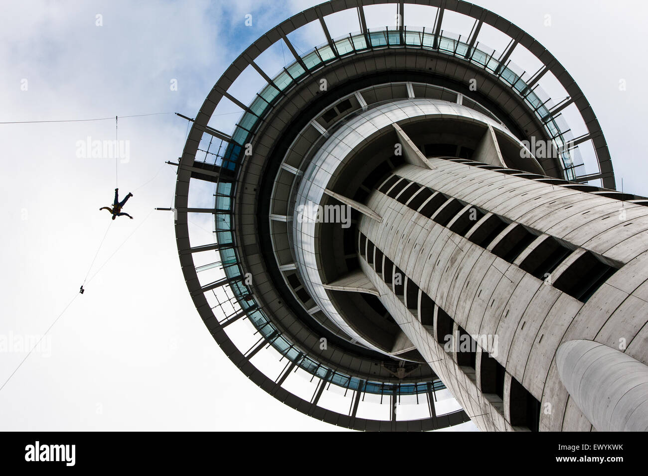 Someone sky diving jumping falling from top of Sky Tower. Auckland,New Zealand Stock Photo