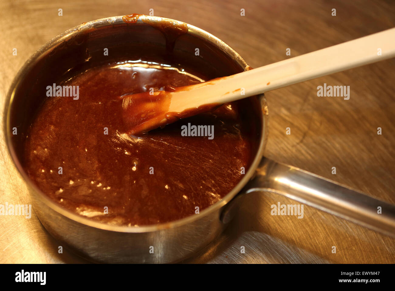 A pan with syrup for making stroopwafels (syrup waffles) in Gouda, the