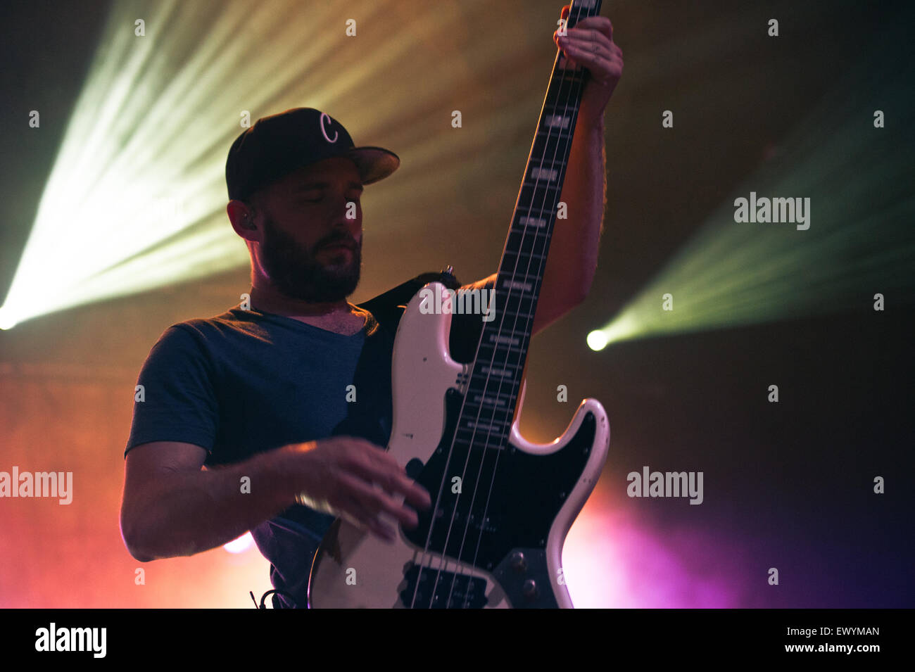 Freiburg, Germany. 2. July, 2015. Chris Rodriguez (Bass) from German rock band Revolverheld performs live during a concert at the ZMF music festival in Freiburg, Germany. Photo: Miroslav Dakov/ Alamy Live News Stock Photo