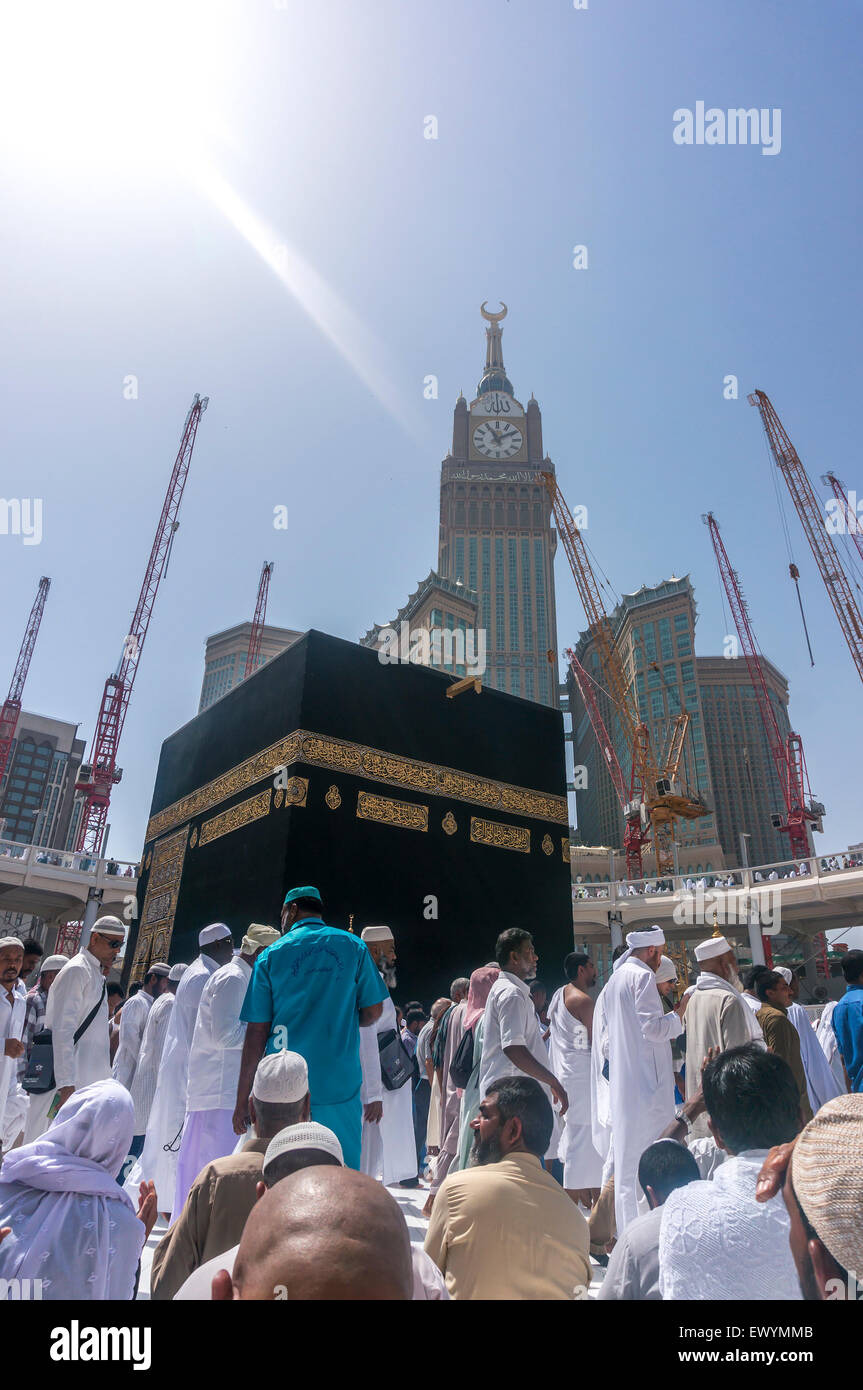 MECCA, SAUDI ARABIA - MARCH 13, 2015: Kaaba with Abraj Al Bait (Royal Clock Tower) background. Stock Photo