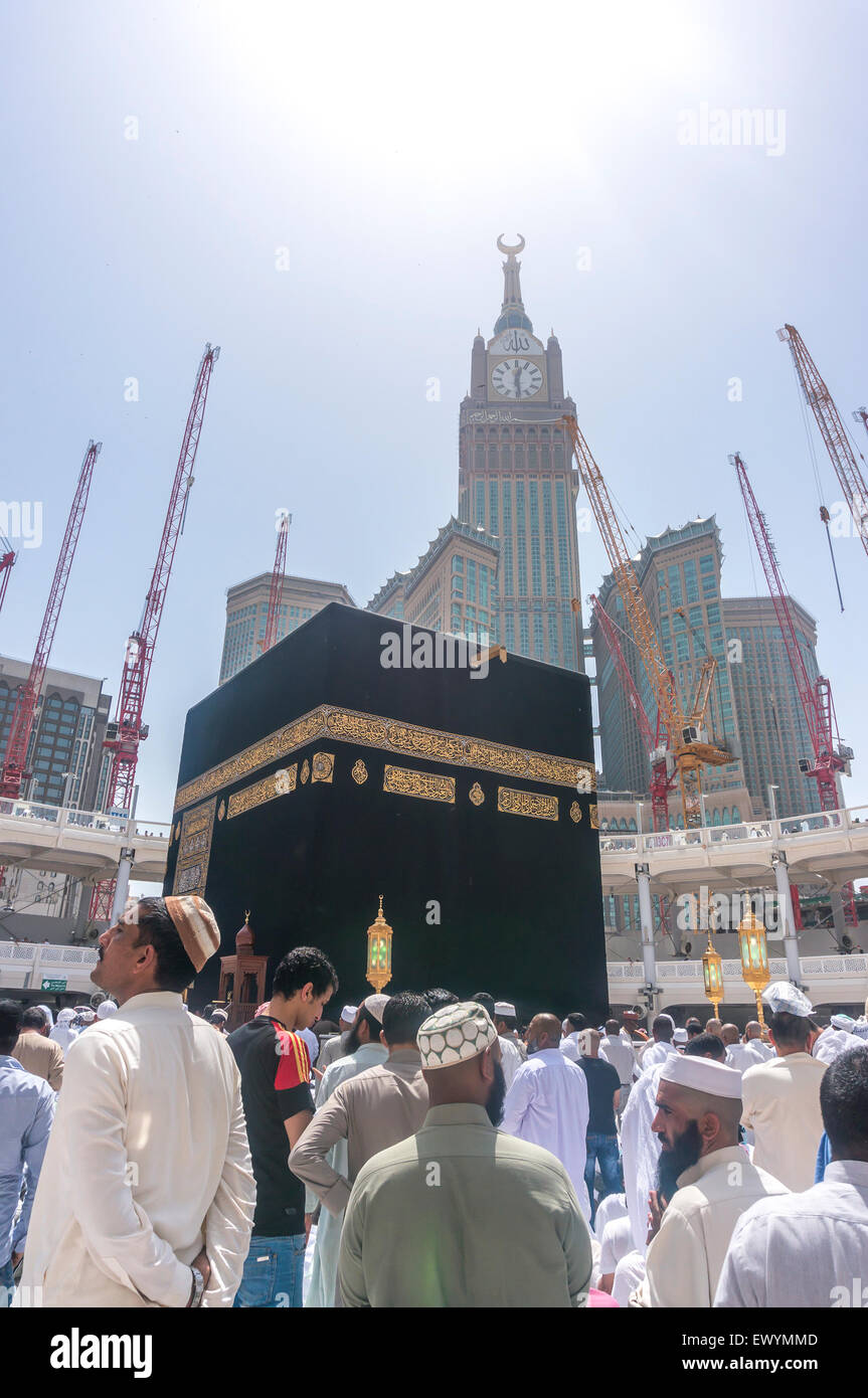 MECCA, SAUDI ARABIA - MARCH 13, 2015: Kaaba with Abraj Al Bait (Royal Clock Tower) background. Stock Photo