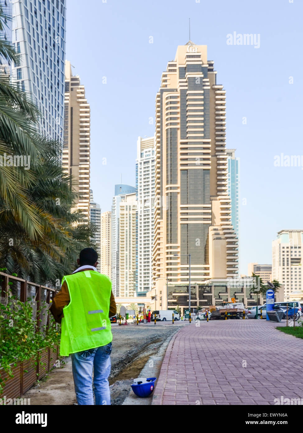 Worker in Dubai Marina, UAE Stock Photo