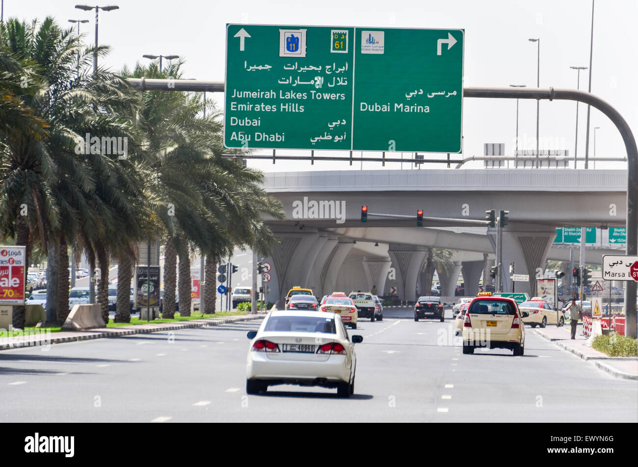 Roads of Dubai, UAE, and signs to Marina, Abu Dhabi, Emirates Hills, Jumeirah Lake Towers Stock Photo