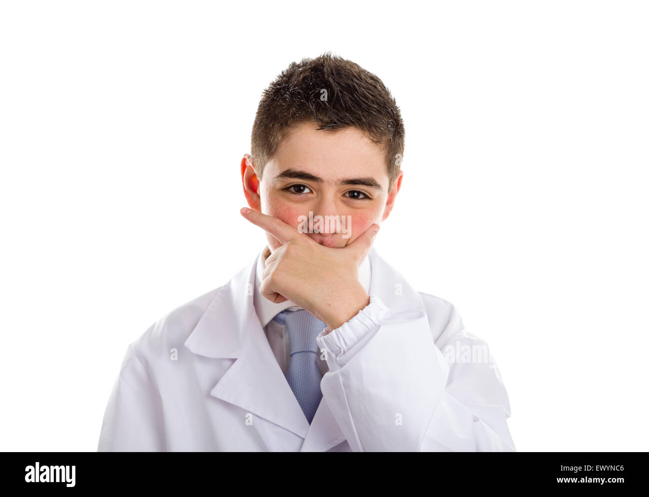 A boy doctor in white coat and blue tie helps to feel medicine more friendly: he covering his mouth while thinking. His acne skin has not ben retouched Stock Photo