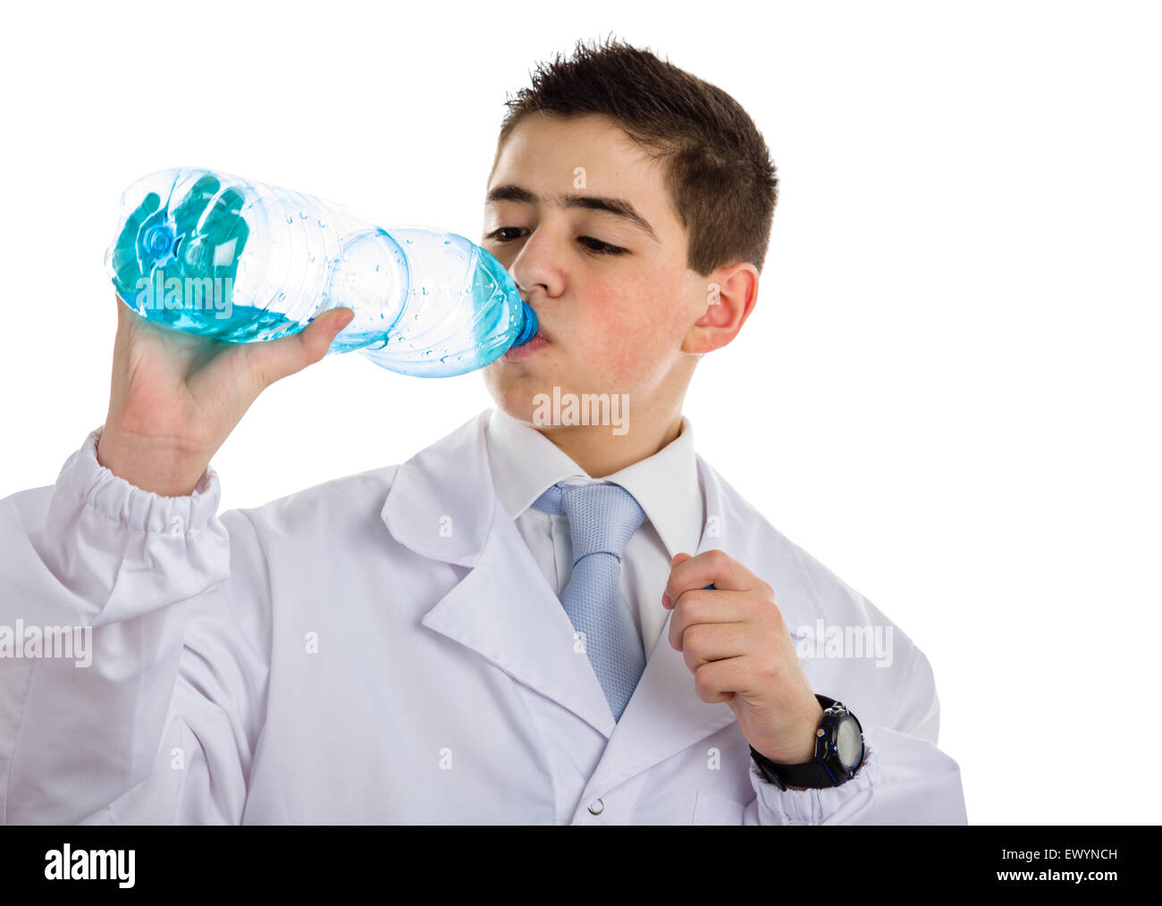 A boy doctor in blue tie and white coat with black digital watch drinking water from plastic bottle. His acne skin has not ben retouched Stock Photo