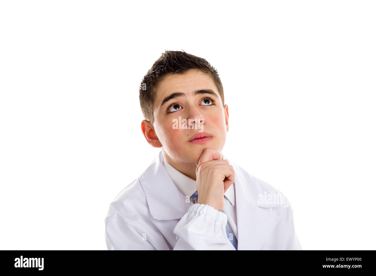 A boy doctor in blue tie and white coat holding his chin while thinking. His acne skin has not ben retouched Stock Photo