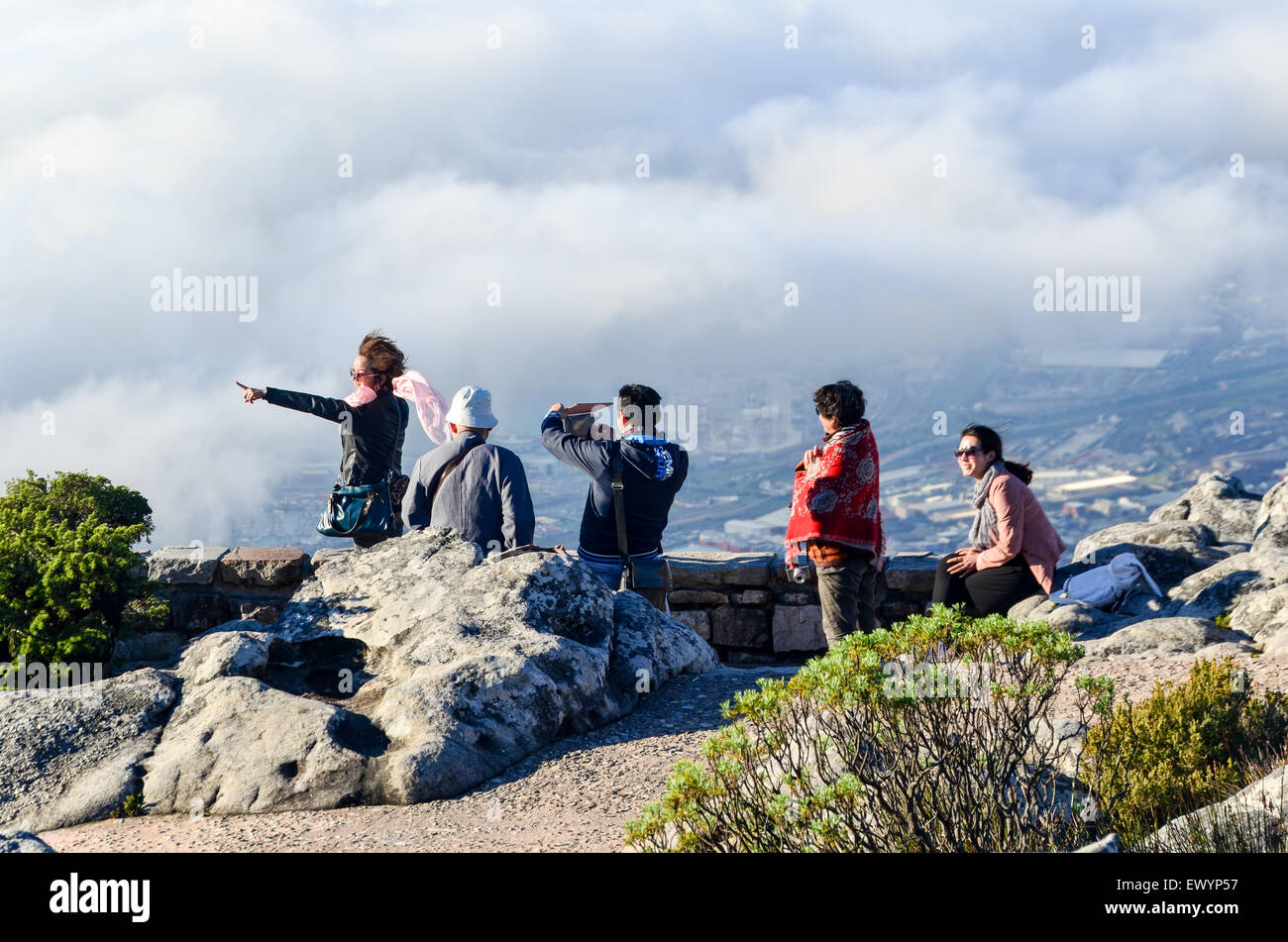 Chinese tourists on the top of Table Mountain overlooking Cape Town Stock Photo