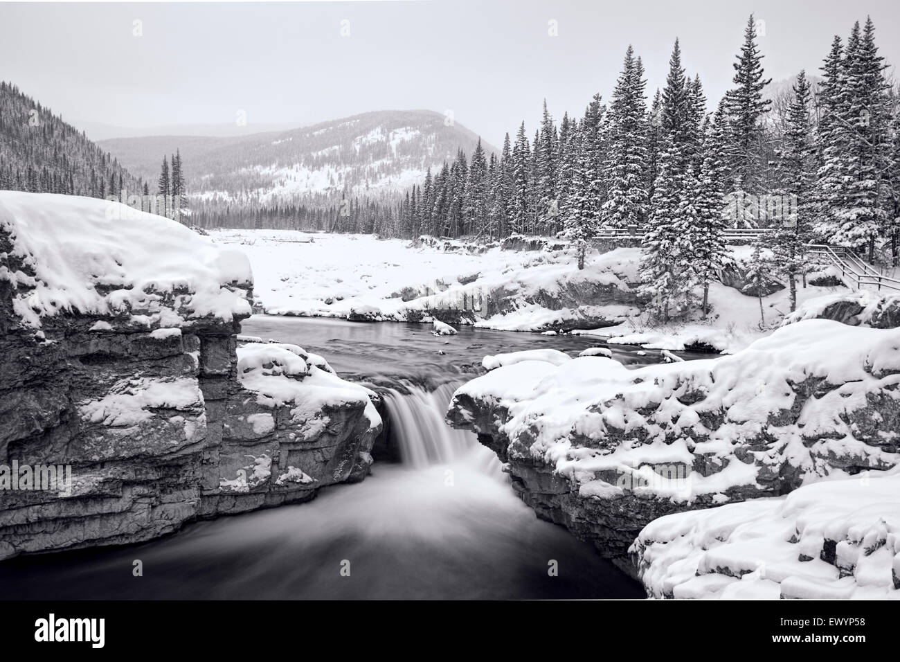 Bragg Creek, Black and White Winter Mountain Waterfalls Stock Photo