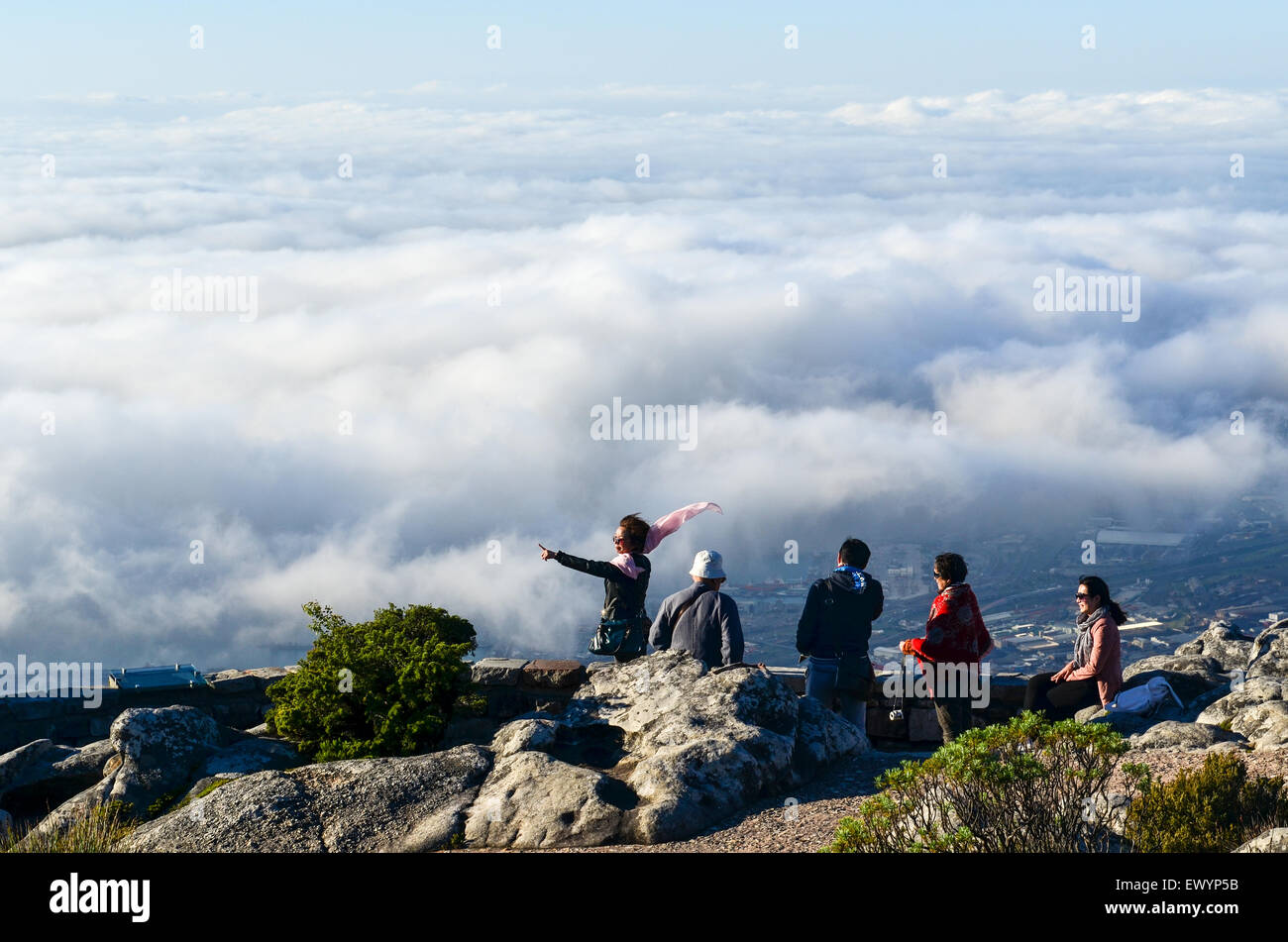 Chinese tourists on the top of Table Mountain overlooking Cape Town Stock Photo