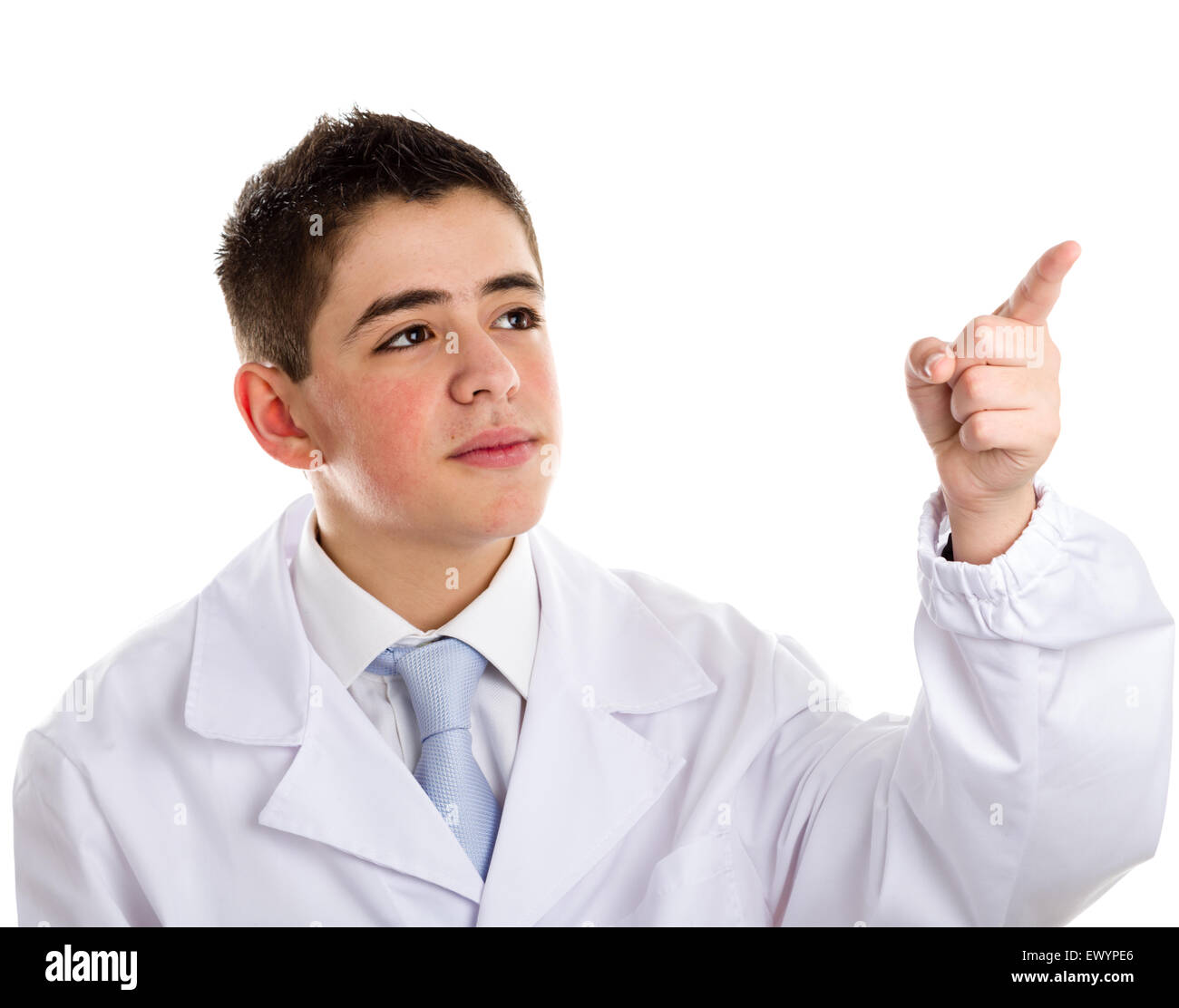 A boy doctor in white coat and blue tie helps to feel medicine more friendly: he is pointing with forefinger to his left side.. His acne skin has not ben retouched Stock Photo