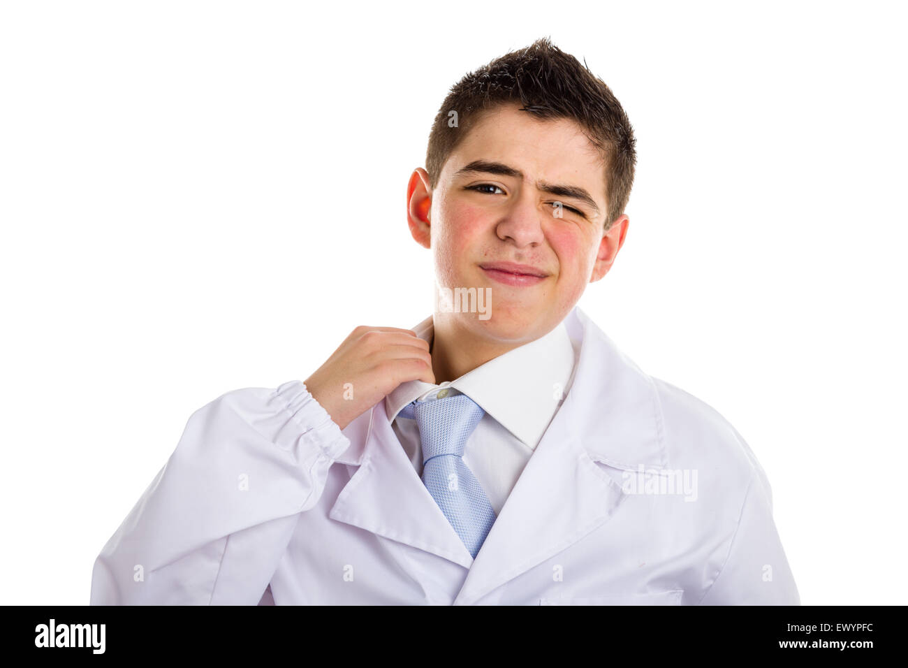 A boy doctor in blue tie and white coat pulling his collar with finger because uncomfortable. His acne skin has not ben retouched Stock Photo