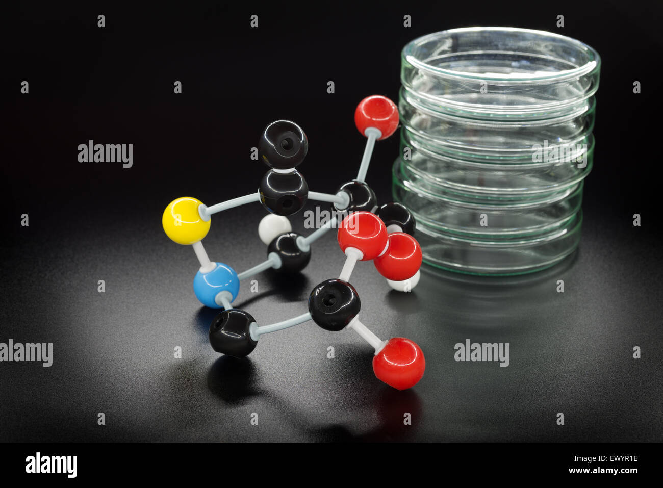 Chemical formula and glass dishes on black background Stock Photo Alamy