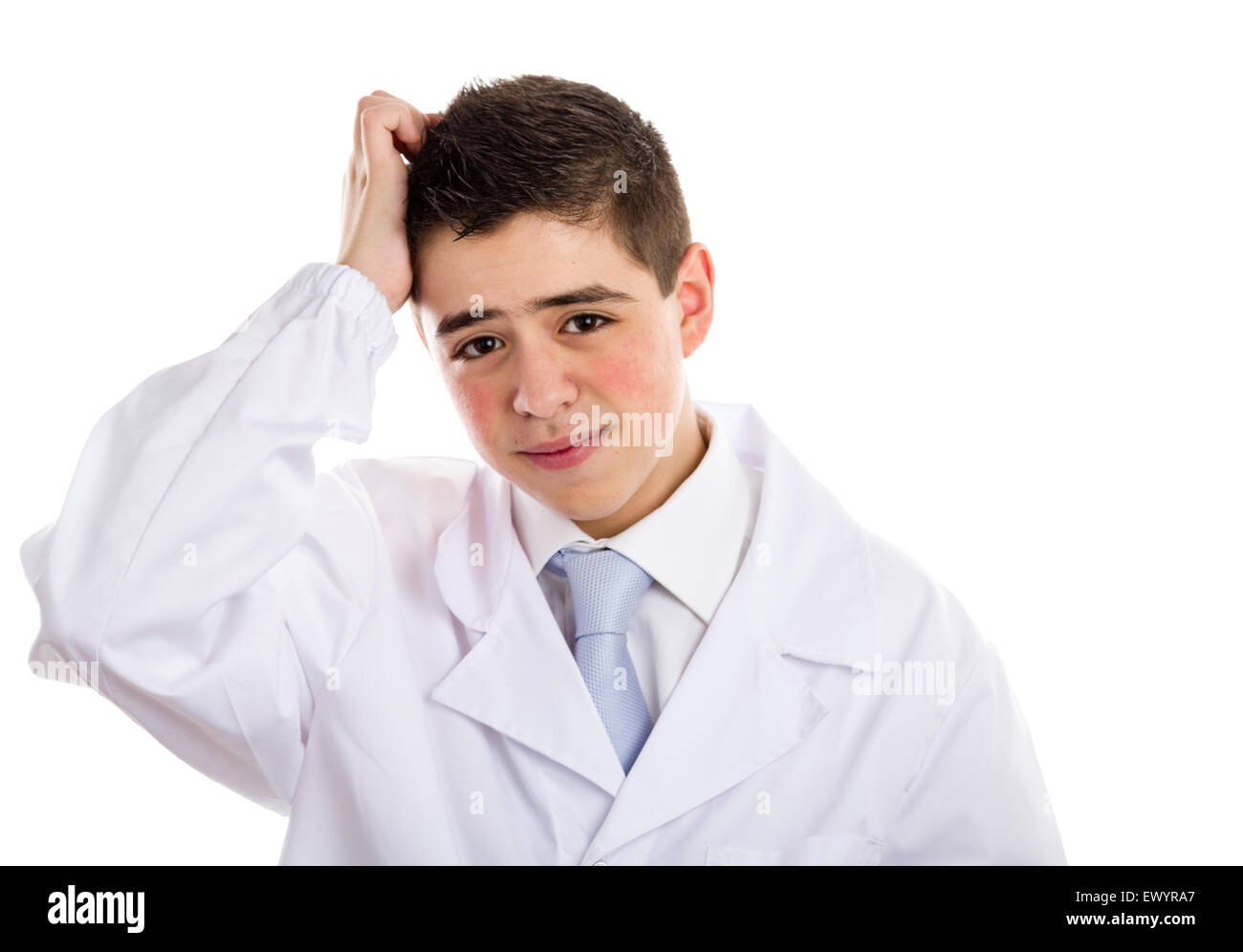 A boy doctor in white coat and blue tie helps to feel medicine more friendly: he is smiling while holding his head. His acne skin has not ben retouched Stock Photo