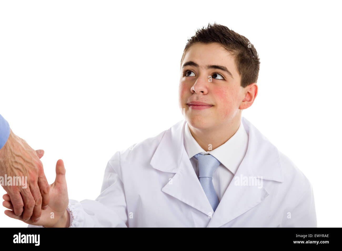 A boy doctor in white coat and blue tie helps to feel medicine more friendly: he is smiling while shaking hand. His acne skin has not ben retouched Stock Photo