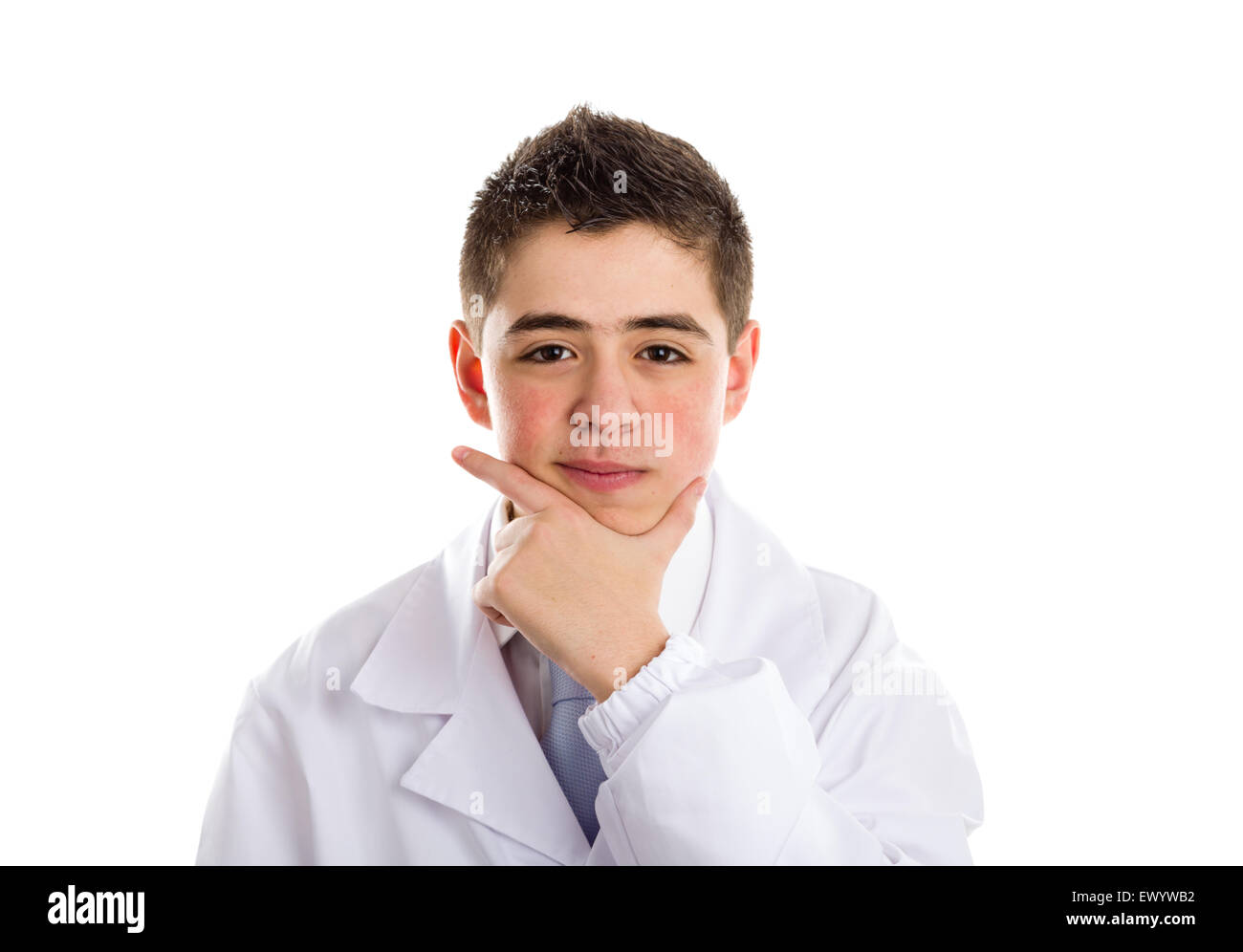 A boy doctor in white coat and blue tie helps to feel medicine more friendly: he is touching his chin while thinking. His acne skin has not ben retouched Stock Photo