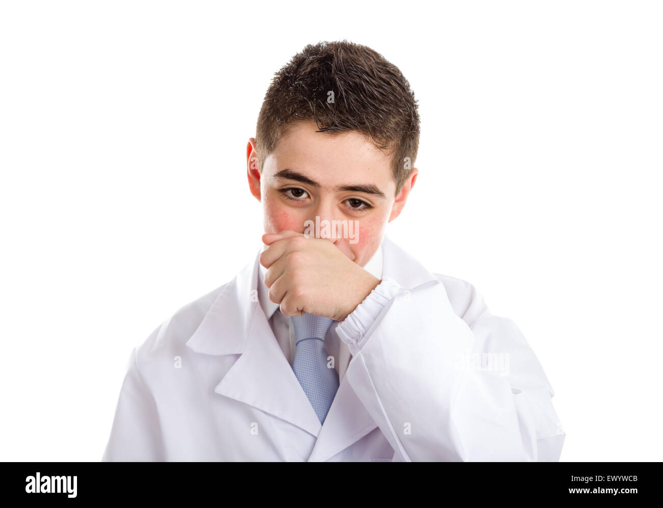 A boy doctor in white coat and blue tie helps to feel medicine more friendly: he is touching his nose. His acne skin has not ben retouched Stock Photo