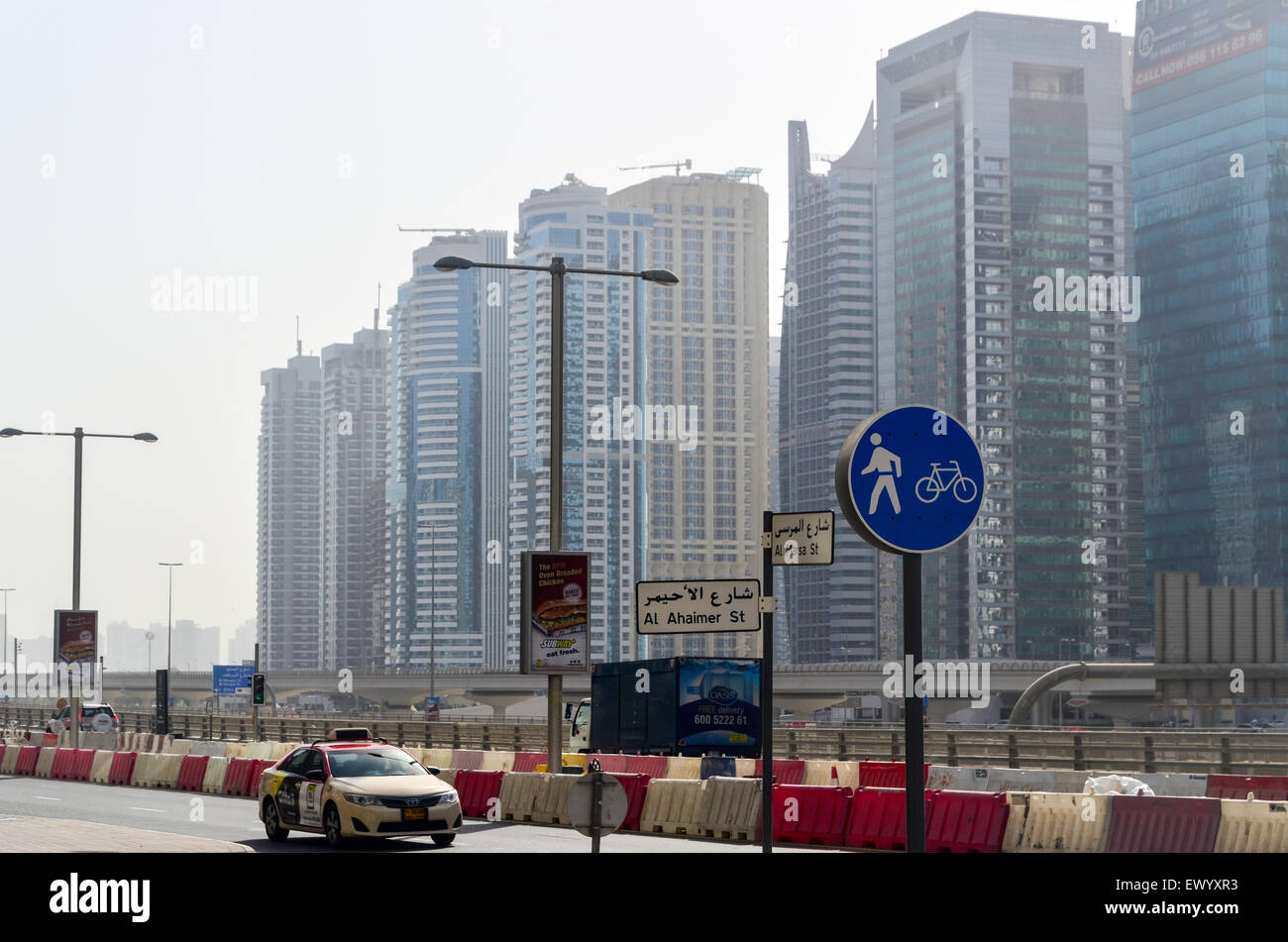 Jumeirah Lakes Towers - Dubai, UAE, and pedestrian/cyclist road sign Stock Photo