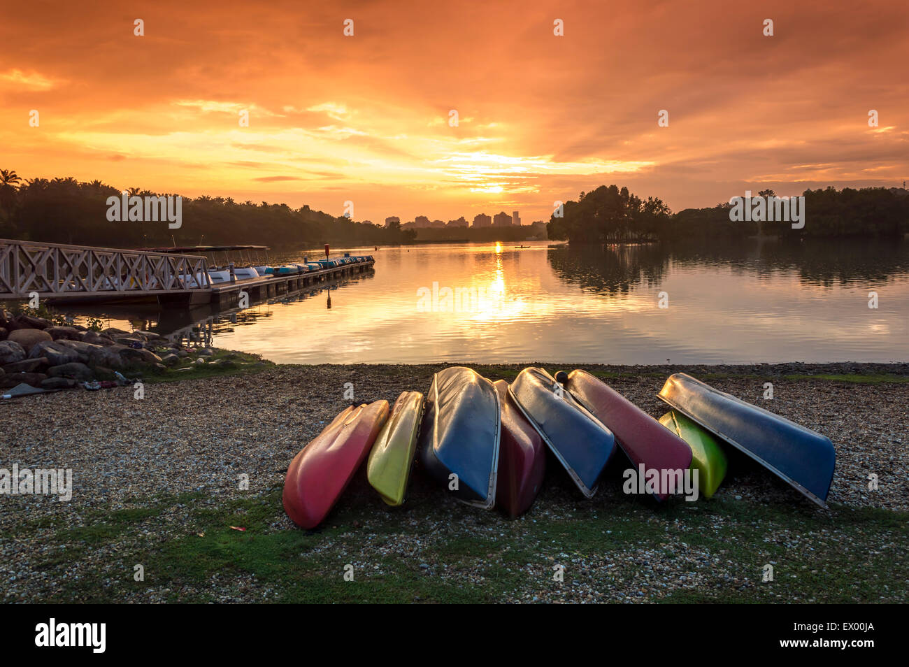 Canoe with sunset background Stock Photo