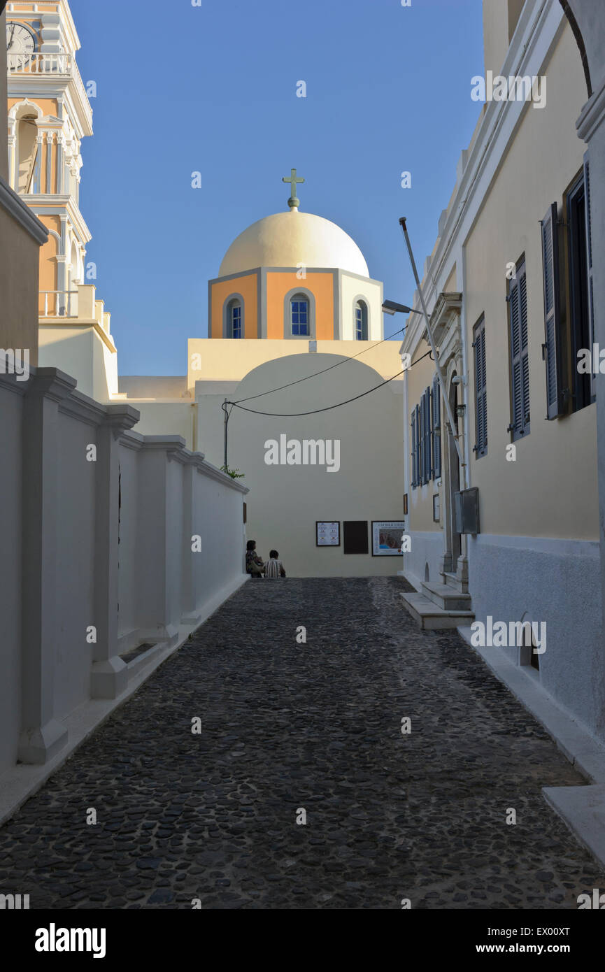 The clock tower of Saint John the Baptist Cathedral in Fira, Santorini ...