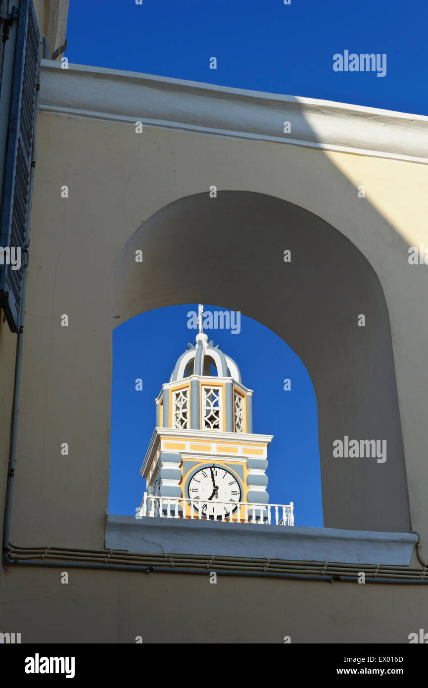 The clock tower of Saint John the Baptist Cathedral in Fira, Santorini ...