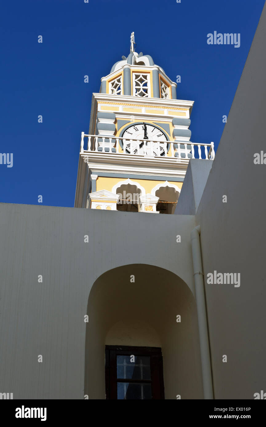 The clock tower of Saint John the Baptist Cathedral in Fira, Santorini ...