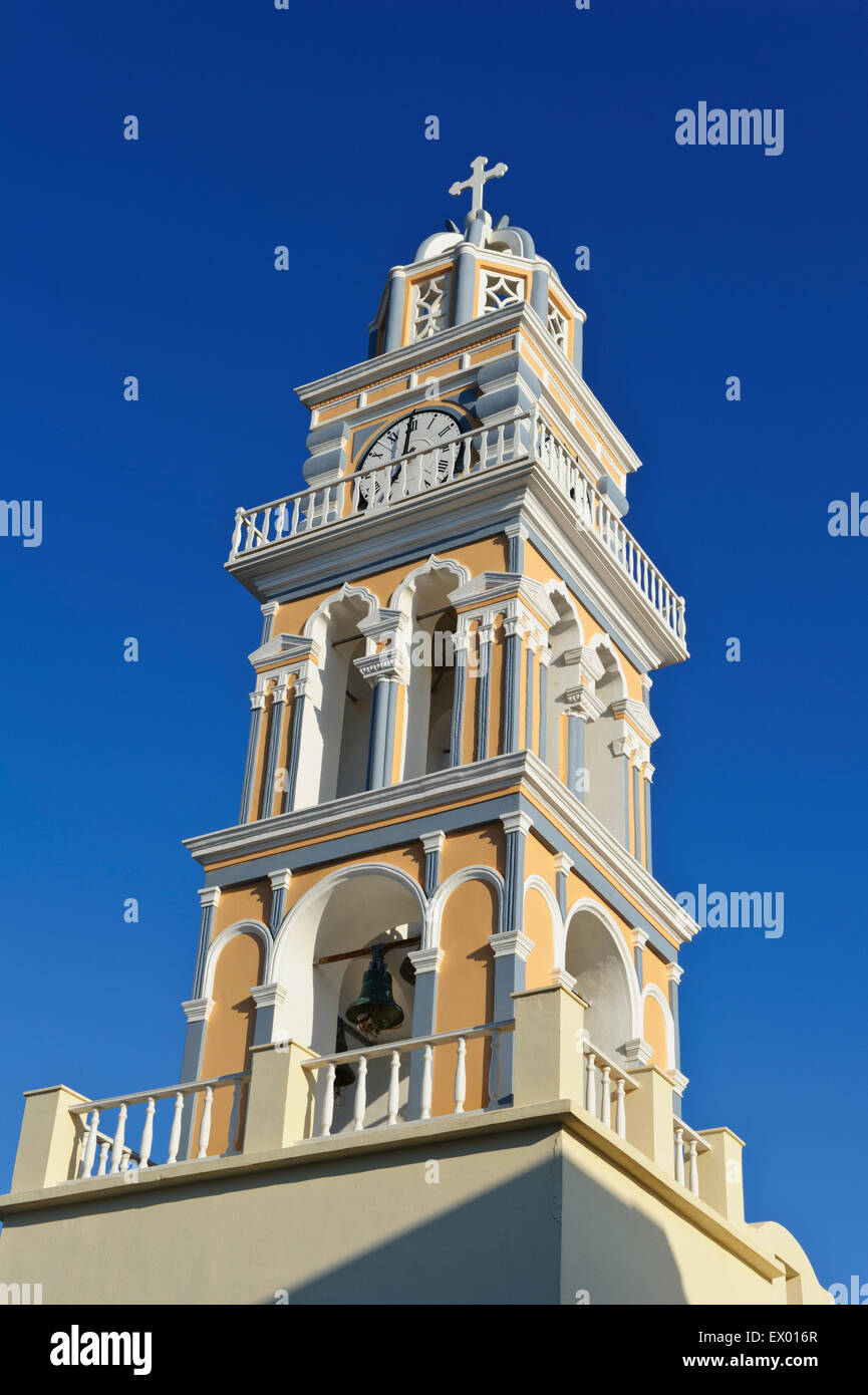 The clock tower of Saint John the Baptist Cathedral in Fira, Santorini ...