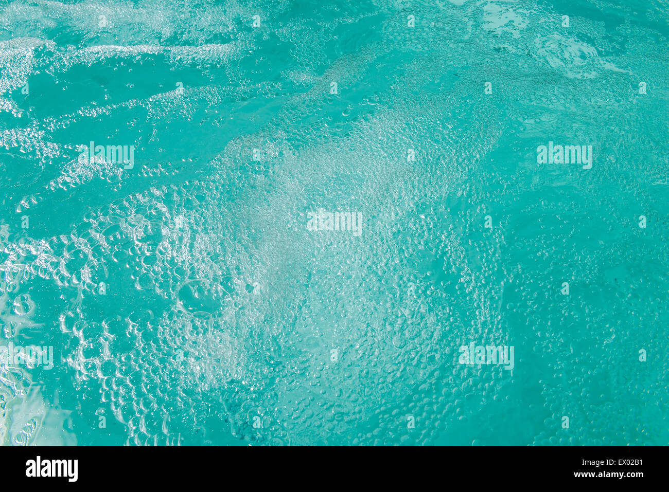 vibrant turquoise water bubbles in the jacuzzi Stock Photo Alamy