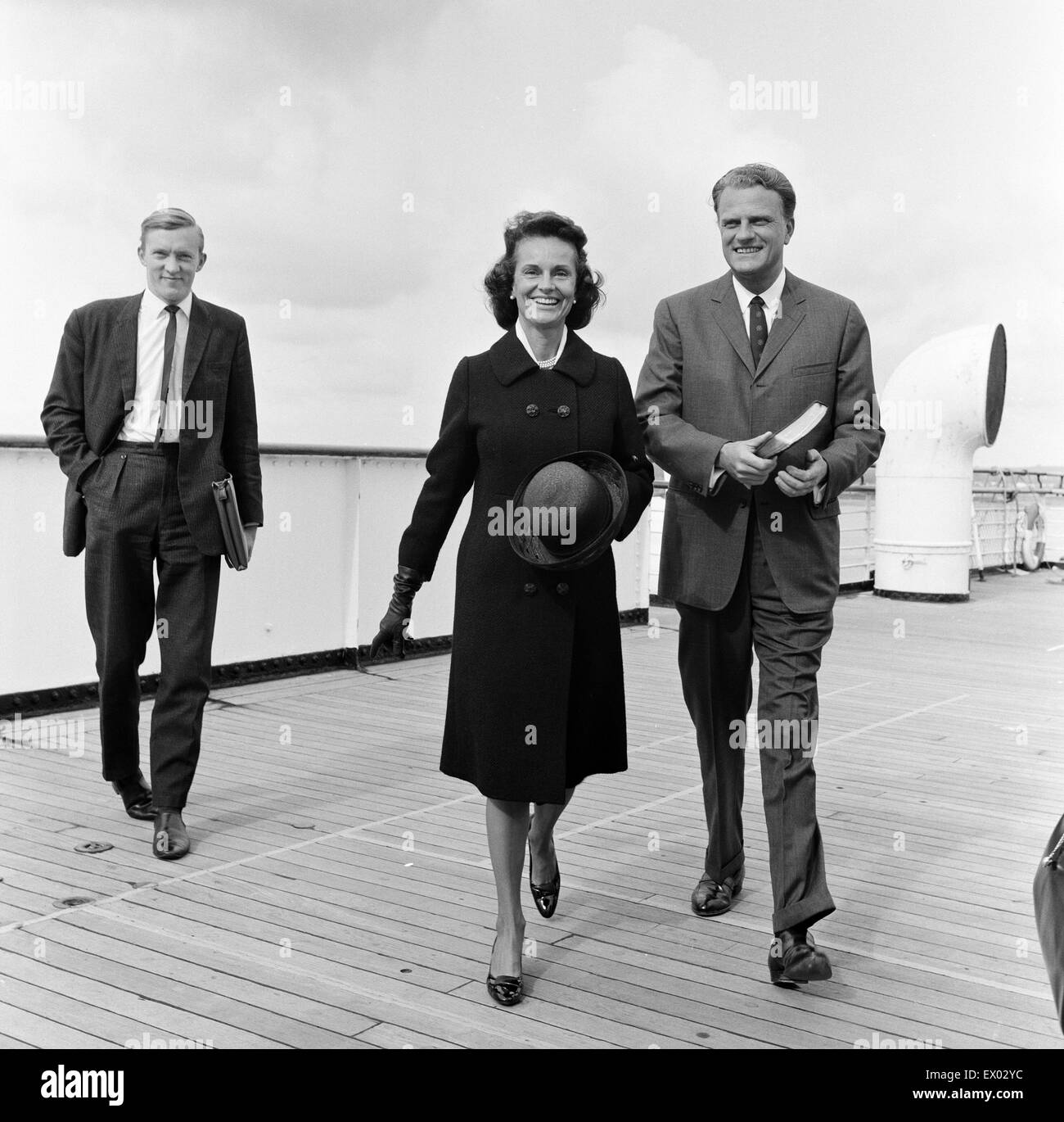 Billy Graham and his wife Ruth pictured on the Queen Mary at Southampton. 24th May 1966. Stock Photo