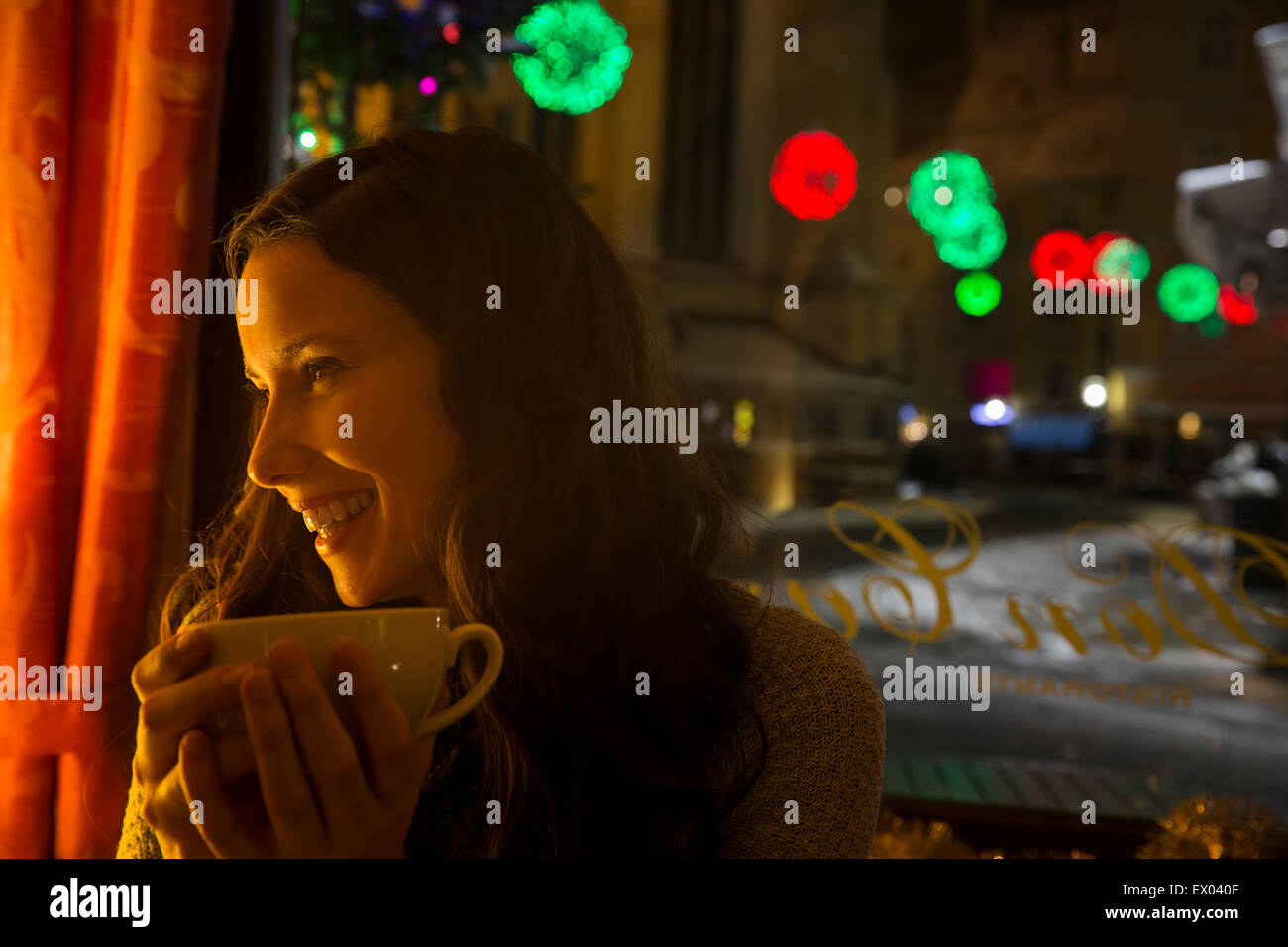 Young mid adult in cafe with coffee Stock Photo