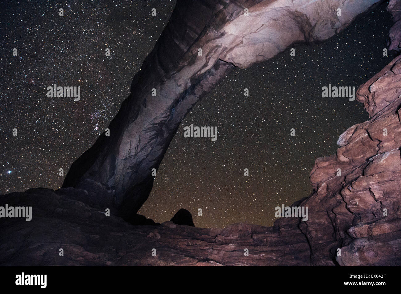 Arch rock formation and starry night sky, Arches National Park, Moab