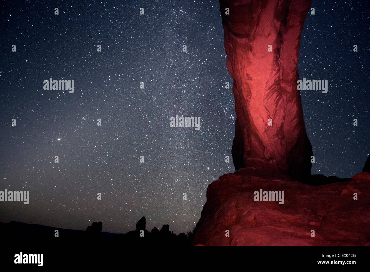 Column rock formation and starry night sky, Arches National Park, Moab