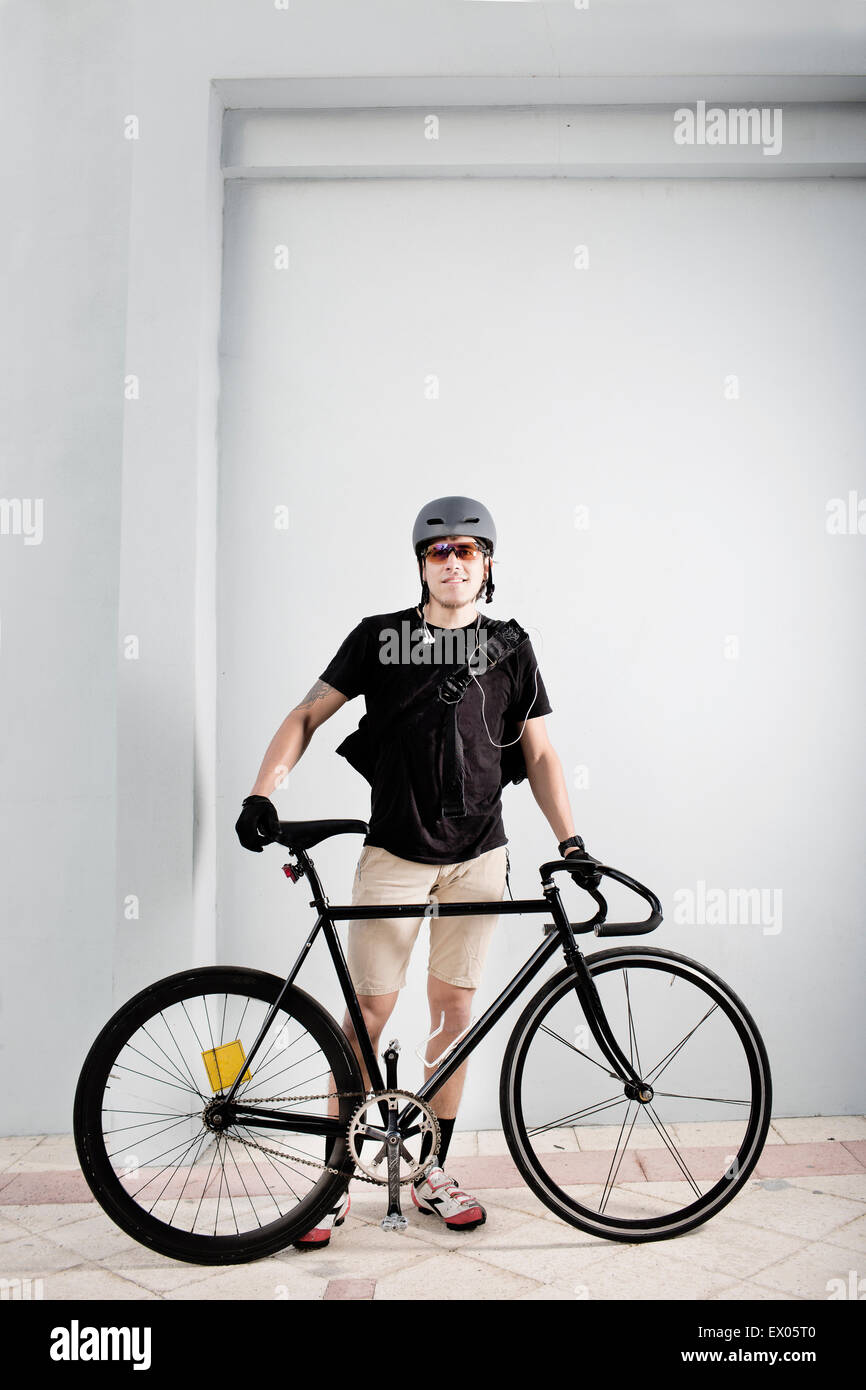 Bike messenger with bike Stock Photo