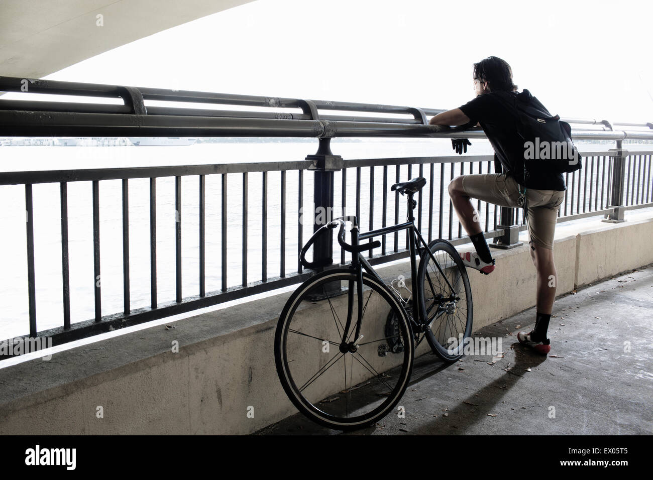 Bike messenger taking break Stock Photo