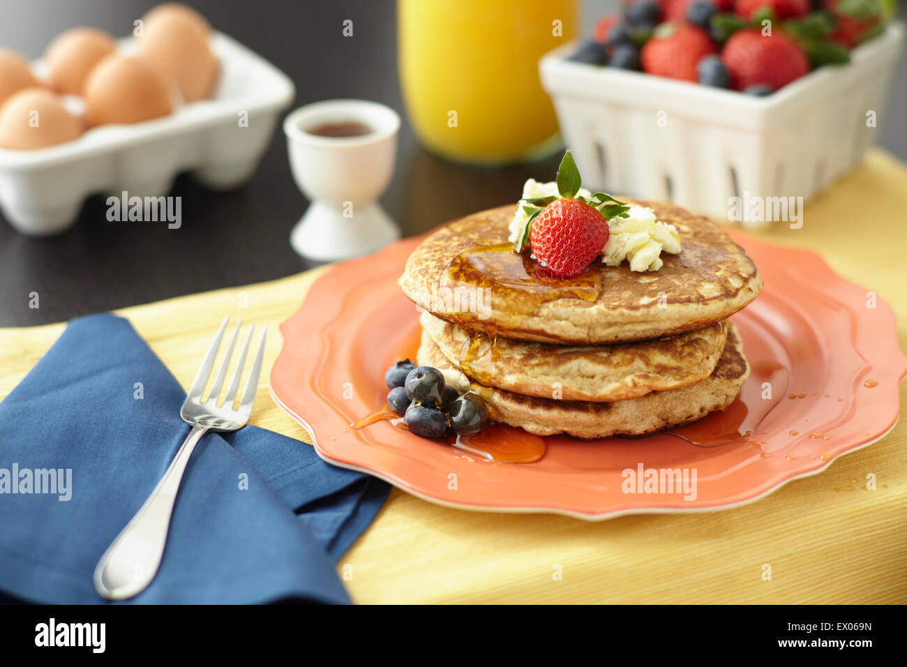 Still life of breakfast pancakes with fruit Stock Photo