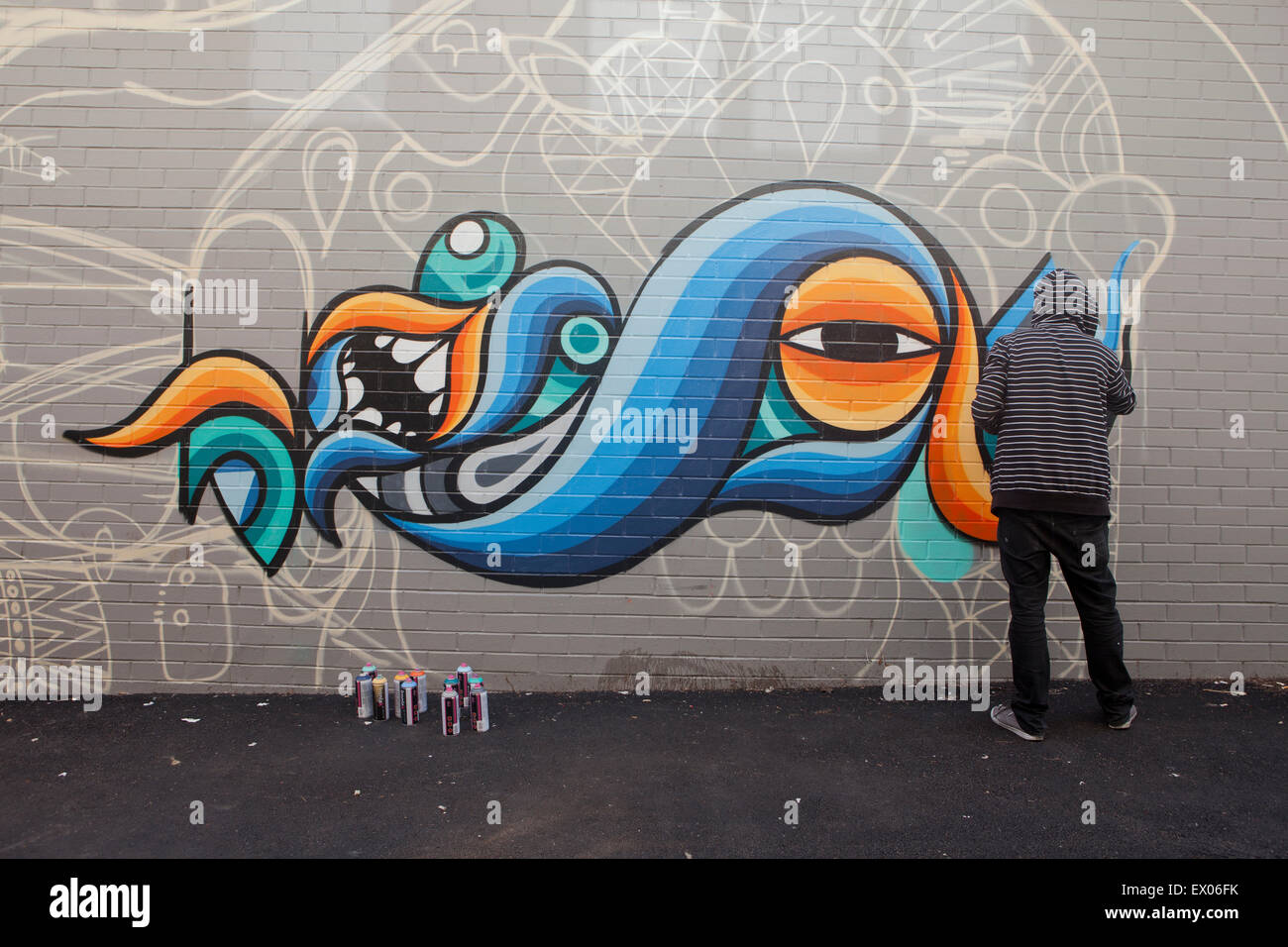 Graffiti Street Artists Paint a mural in Australia Stock Photo Alamy