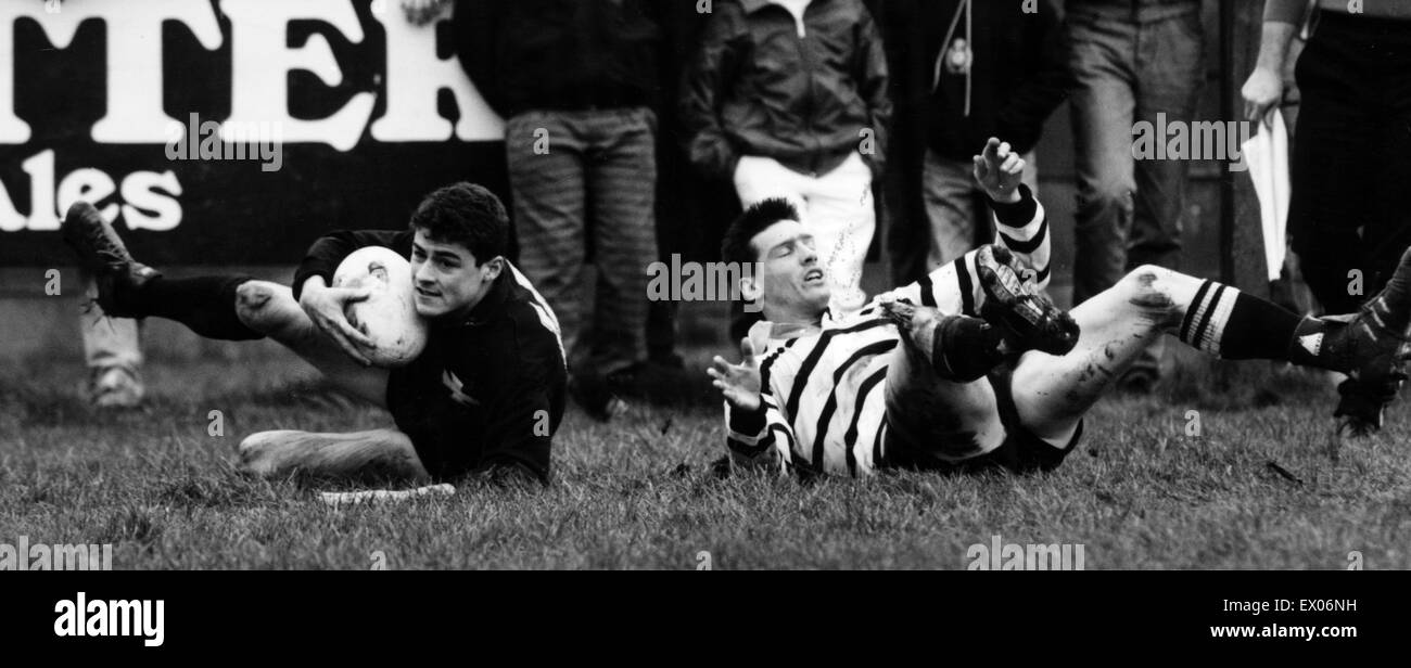 Chris Higgs Neath RFU Player (left) goes over the line, followed by Glamorgan Wanderers Chris Norman, match action, Saturday 4th March 1989. Stock Photo