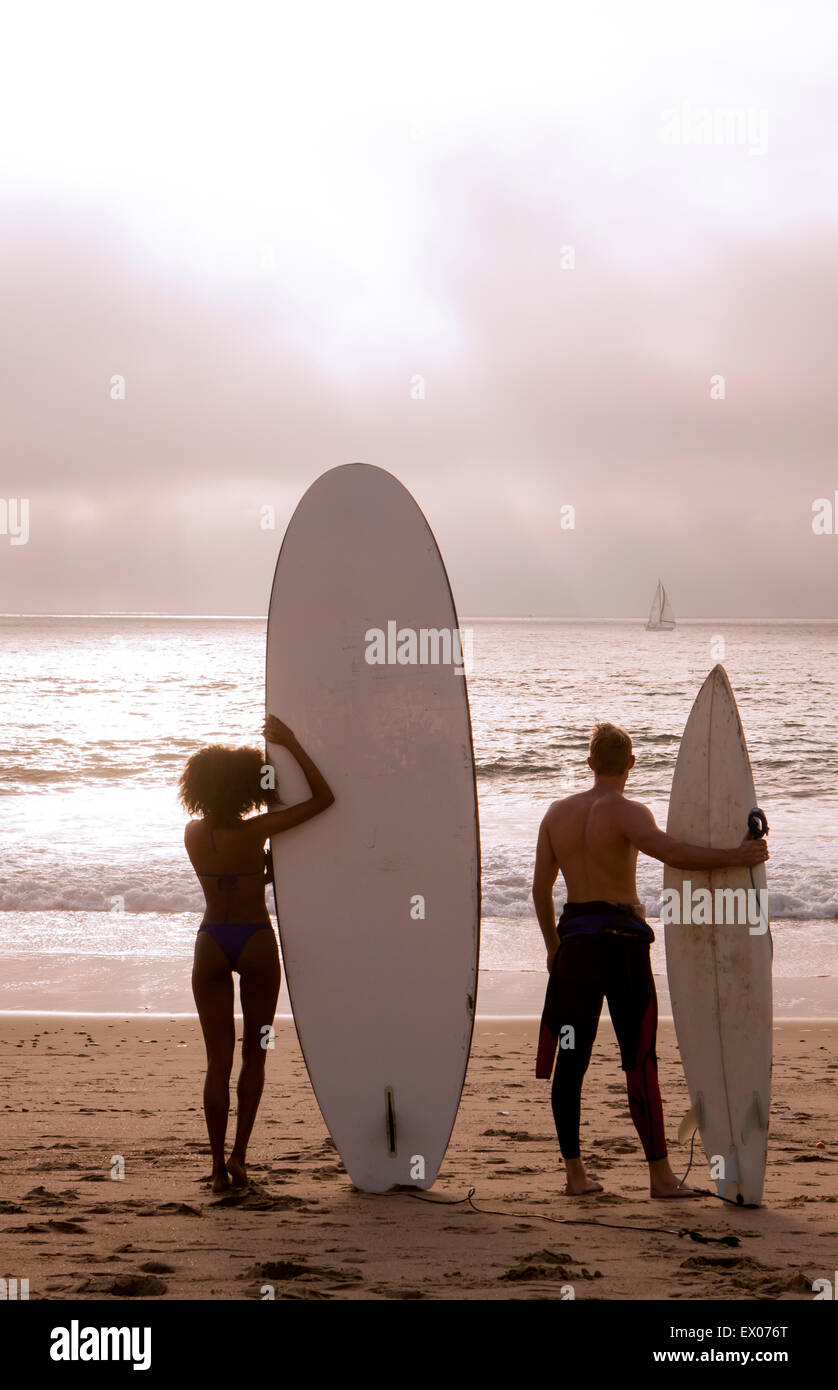 Young female surfer looking out hi-res stock photography and images - Alamy